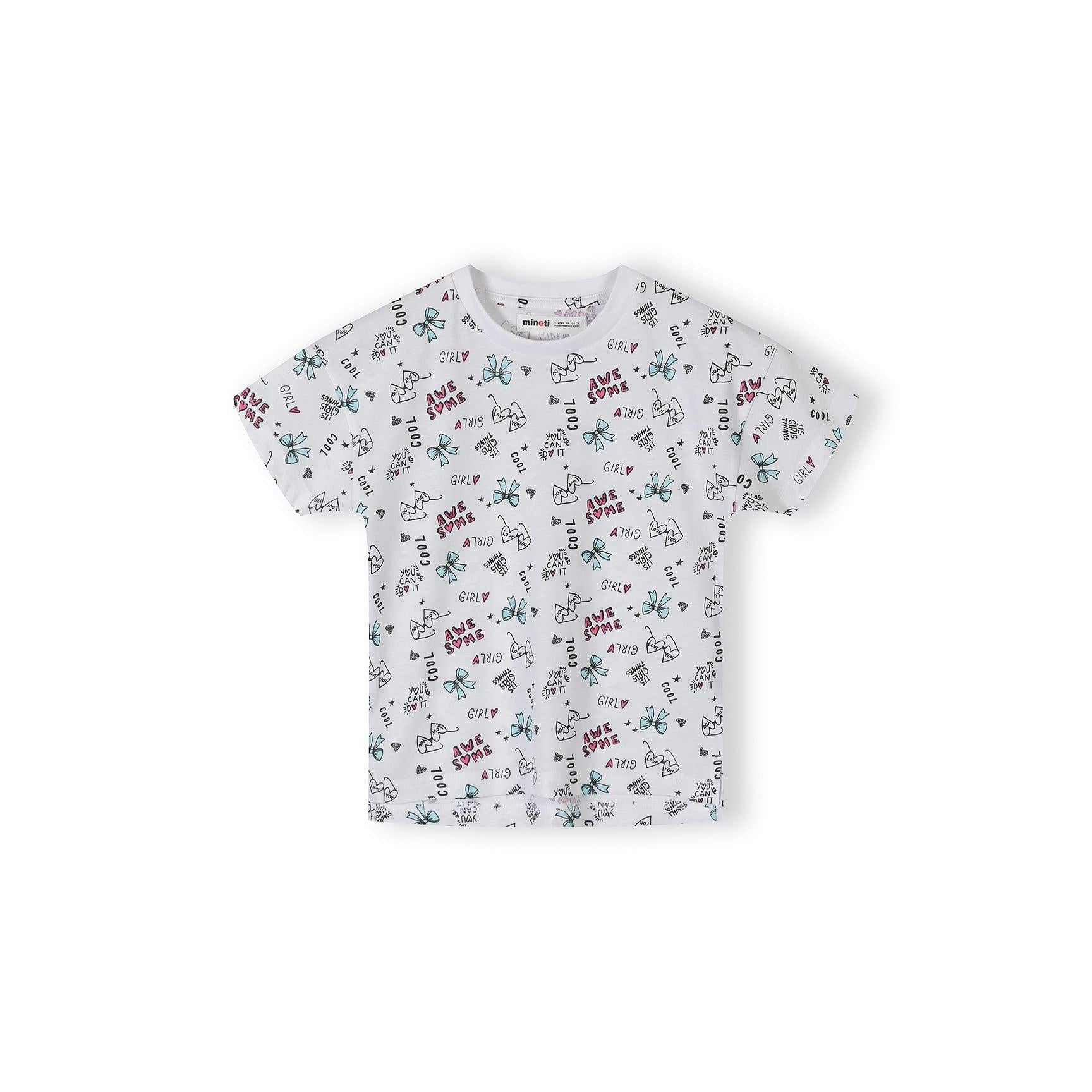 Single white cotton t-shirt with all-over bow print pattern featuring blue bows, pink text reading 'AWESOME' and 'GIRLY' scattered across fabric on white background