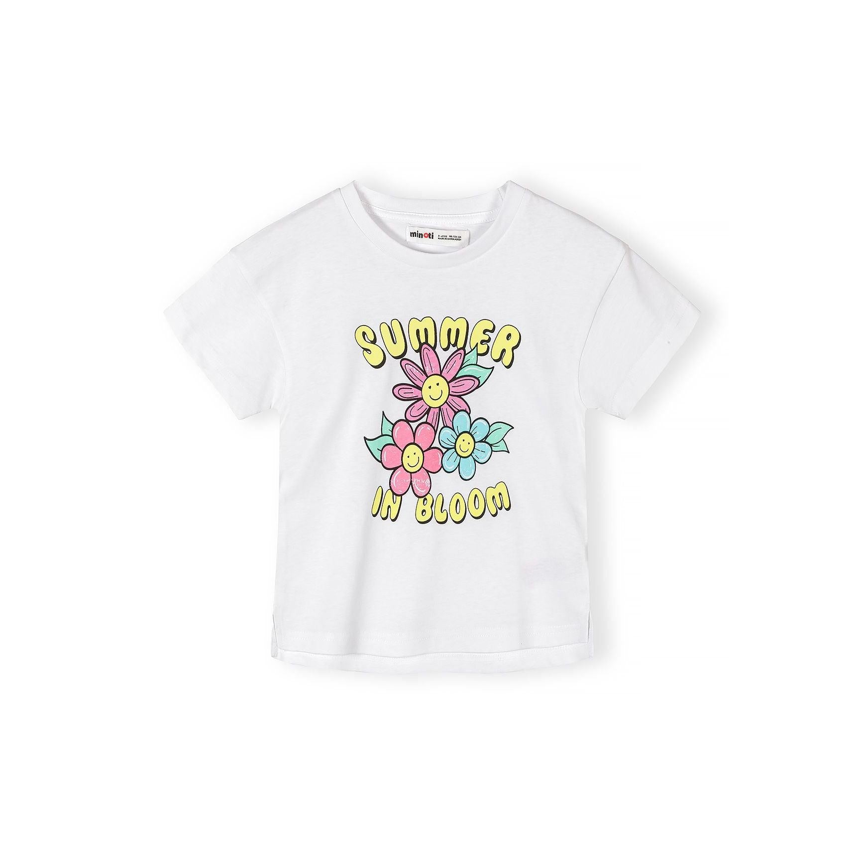 Close-up detail of white t-shirt showing Summer in Bloom print with smiling daisy flowers in pink and blue with yellow centers and green leaves
