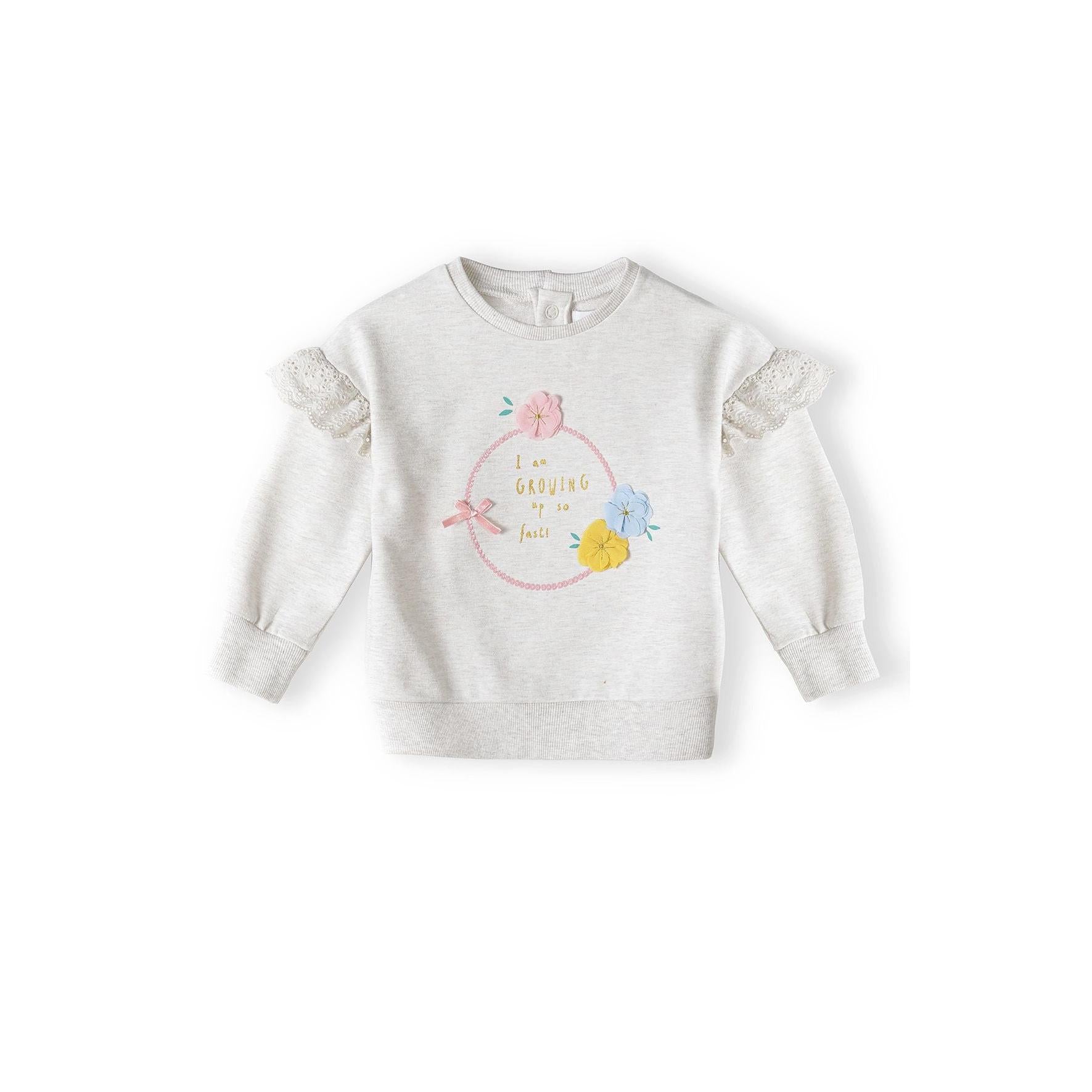 Pink ribbed leggings with scattered small multicoloured print pattern shown flat against white background