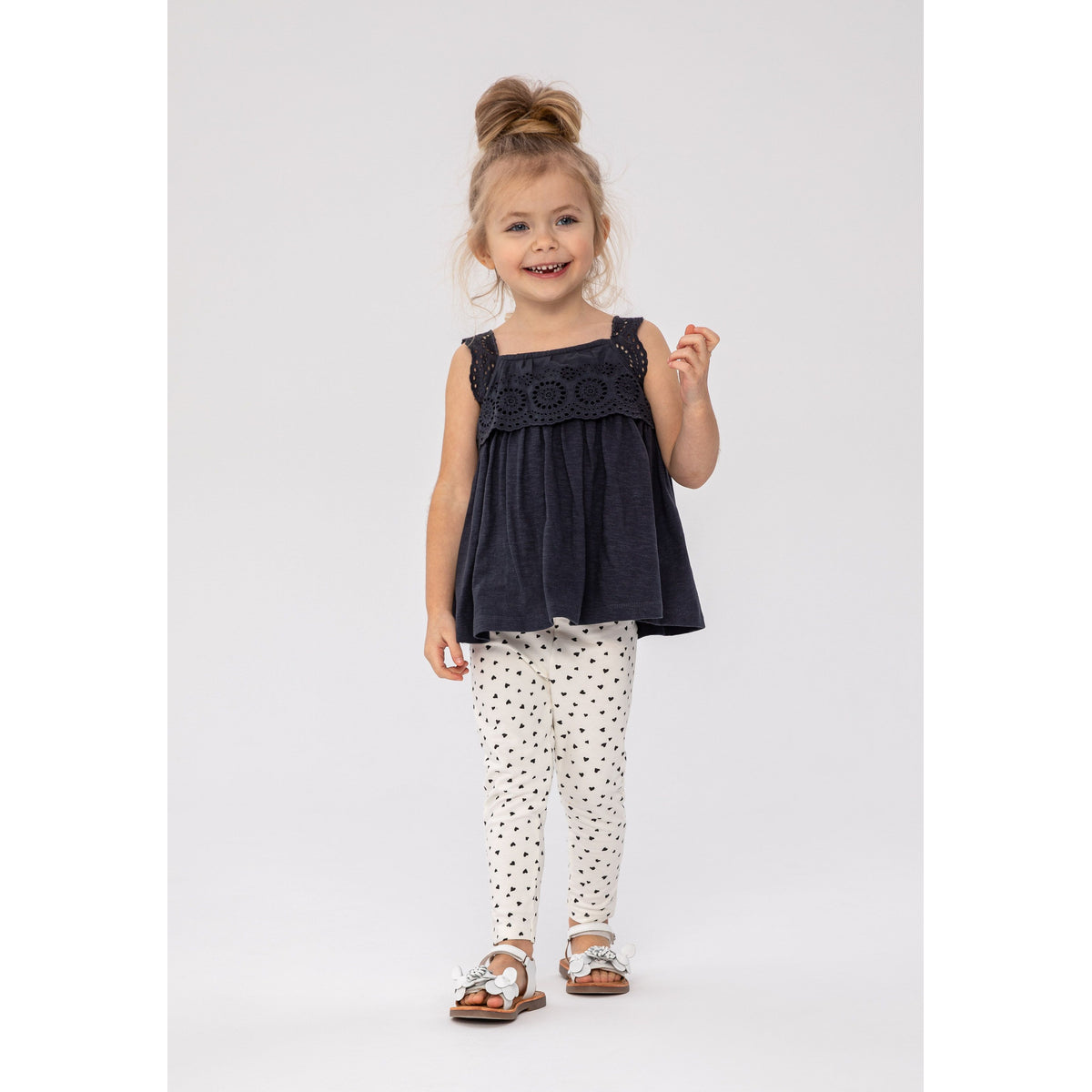 Girls' broderie top and leggings set in navy and white — complete product view for square Shop card