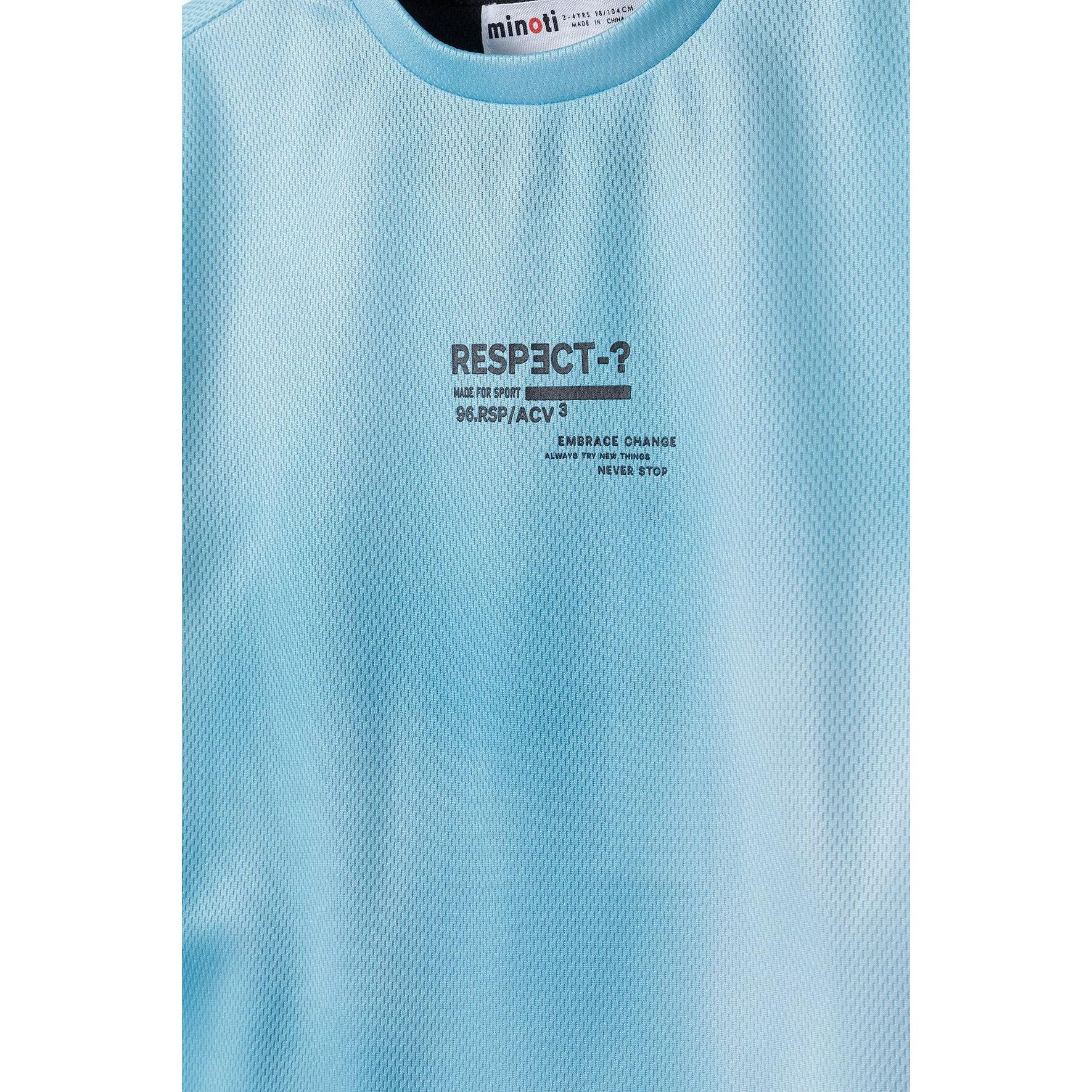 Close-up detail of mint green mesh t-shirt showing 'RESPECT-2' text print on chest with Minoti brand label visible at neck area