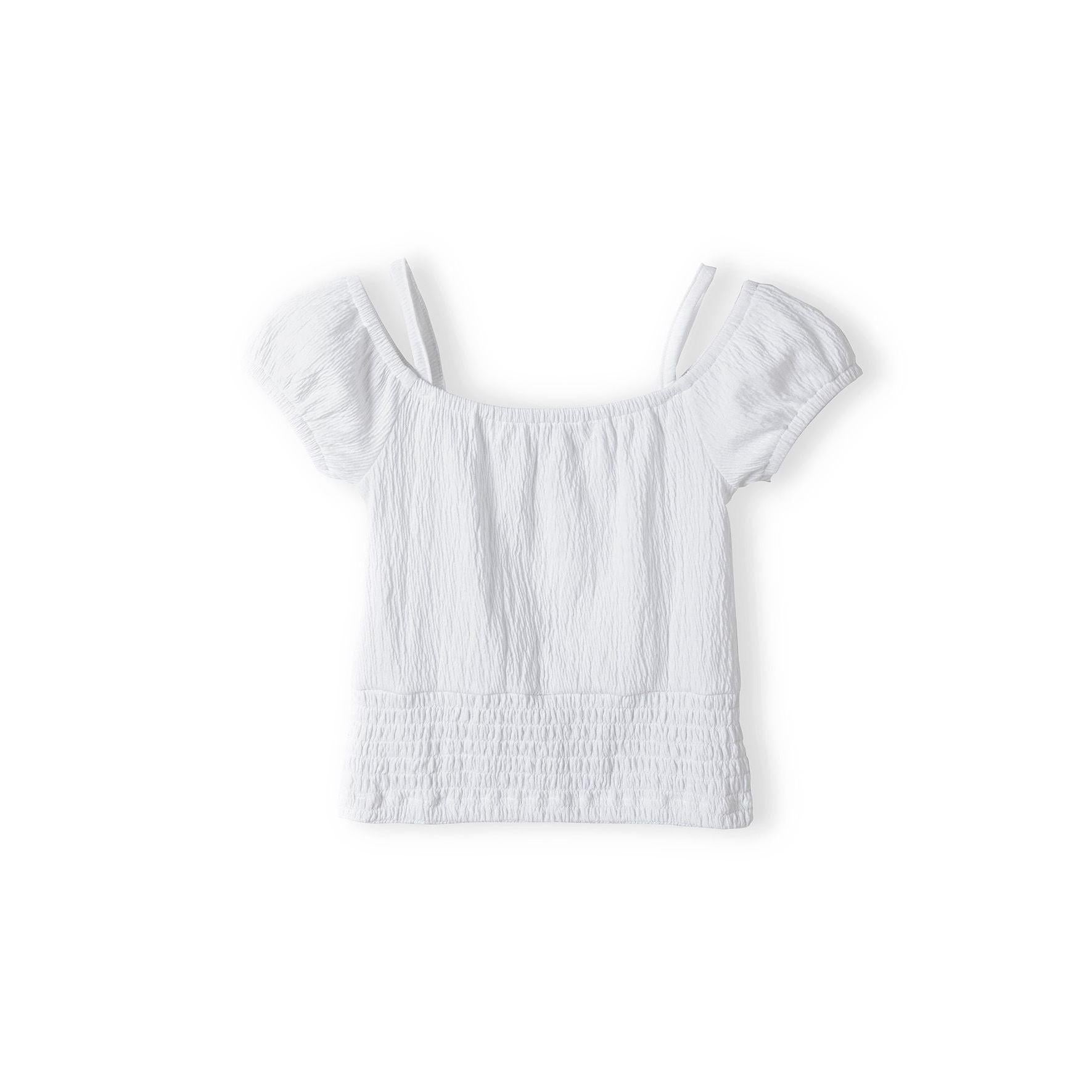 White textured off shoulder top laid flat showing front view with elasticated detailing and gathered fabric texture on white background