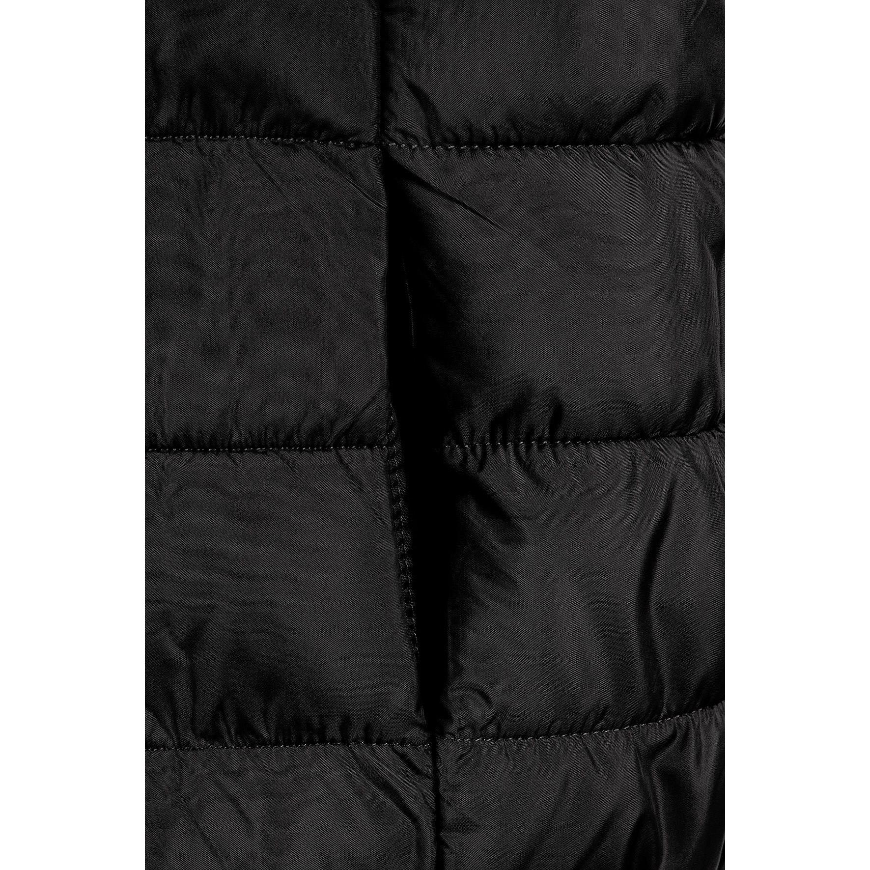 Detail view of black padded gilet front zipper and quilted chest panel construction