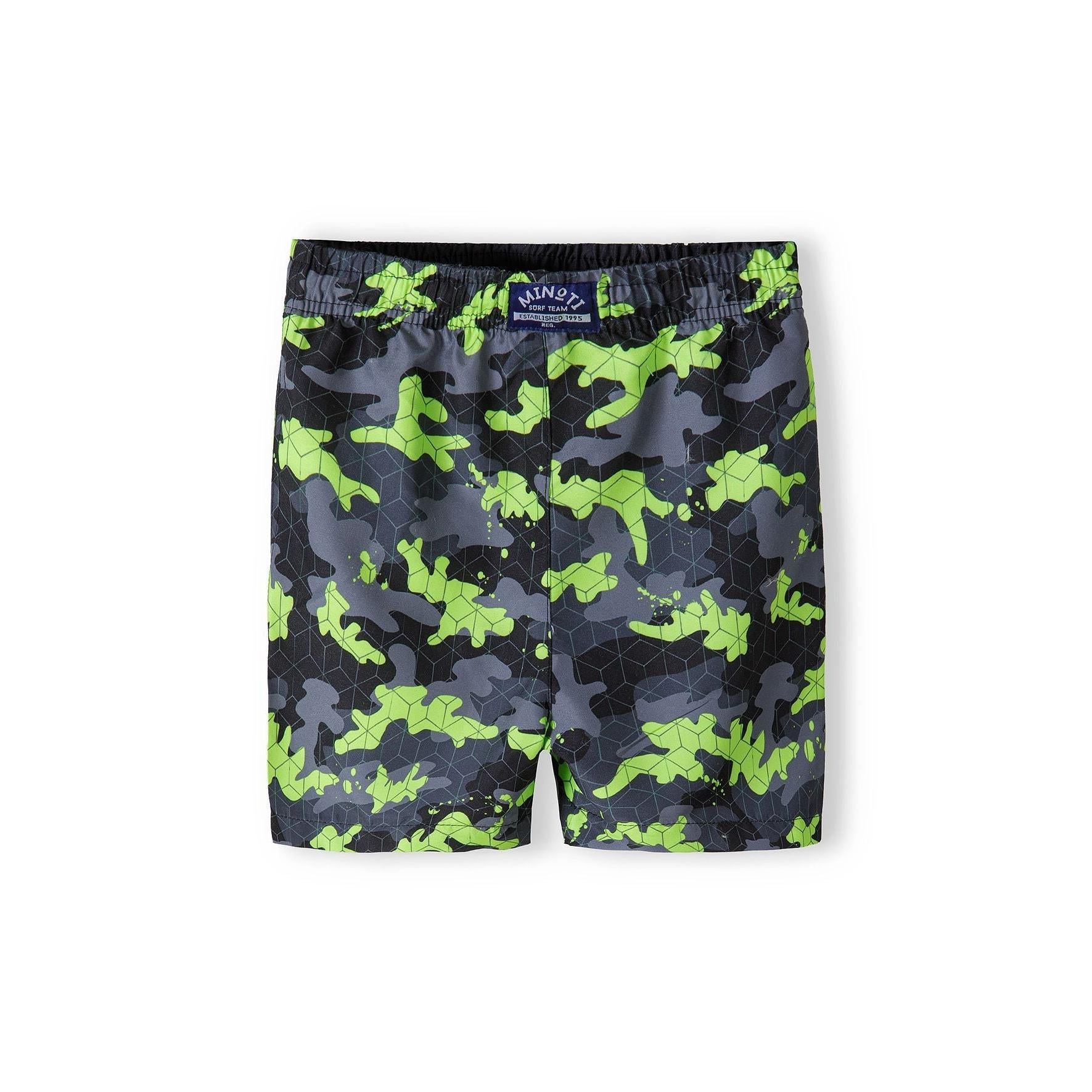 Back view of camouflage board shorts showing Minoti brand label at waistband and full pattern detail