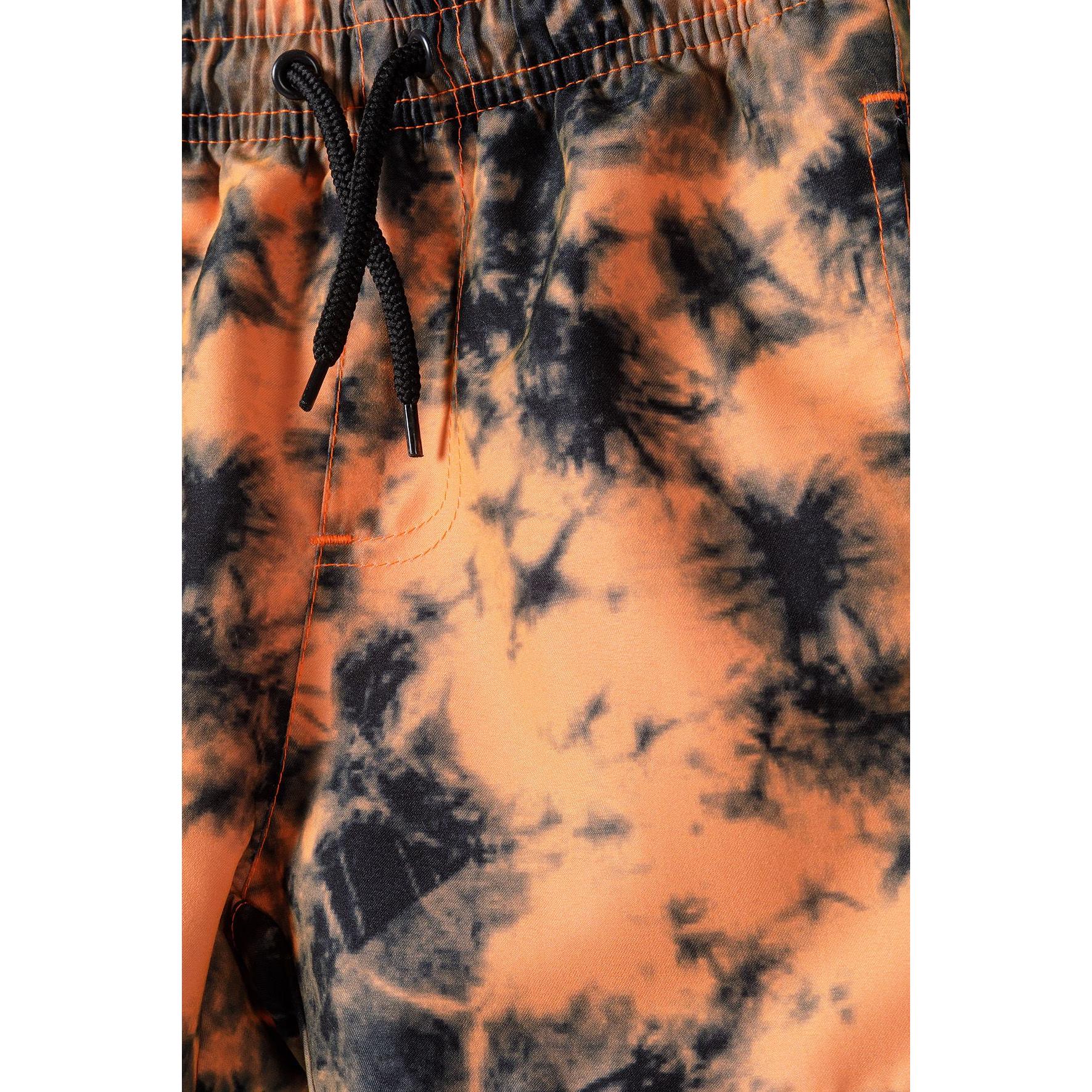 Close-up detail of drawstring waistband showing black cord ties and orange tie-dye fabric texture with contrasting stitching