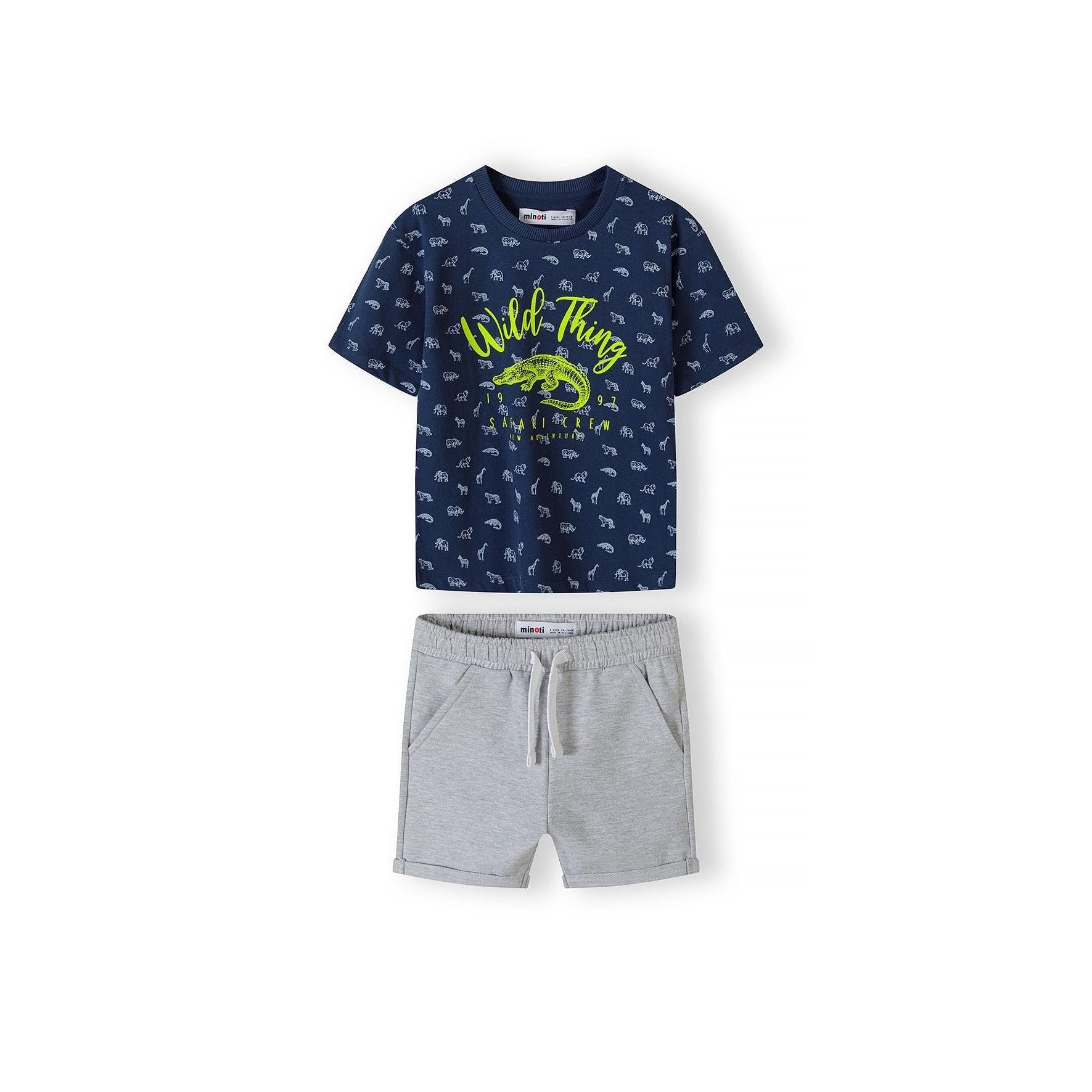 Navy t-shirt with white safari animal print and bright green Wild Thing crocodile graphic displayed with grey fleece shorts on white background