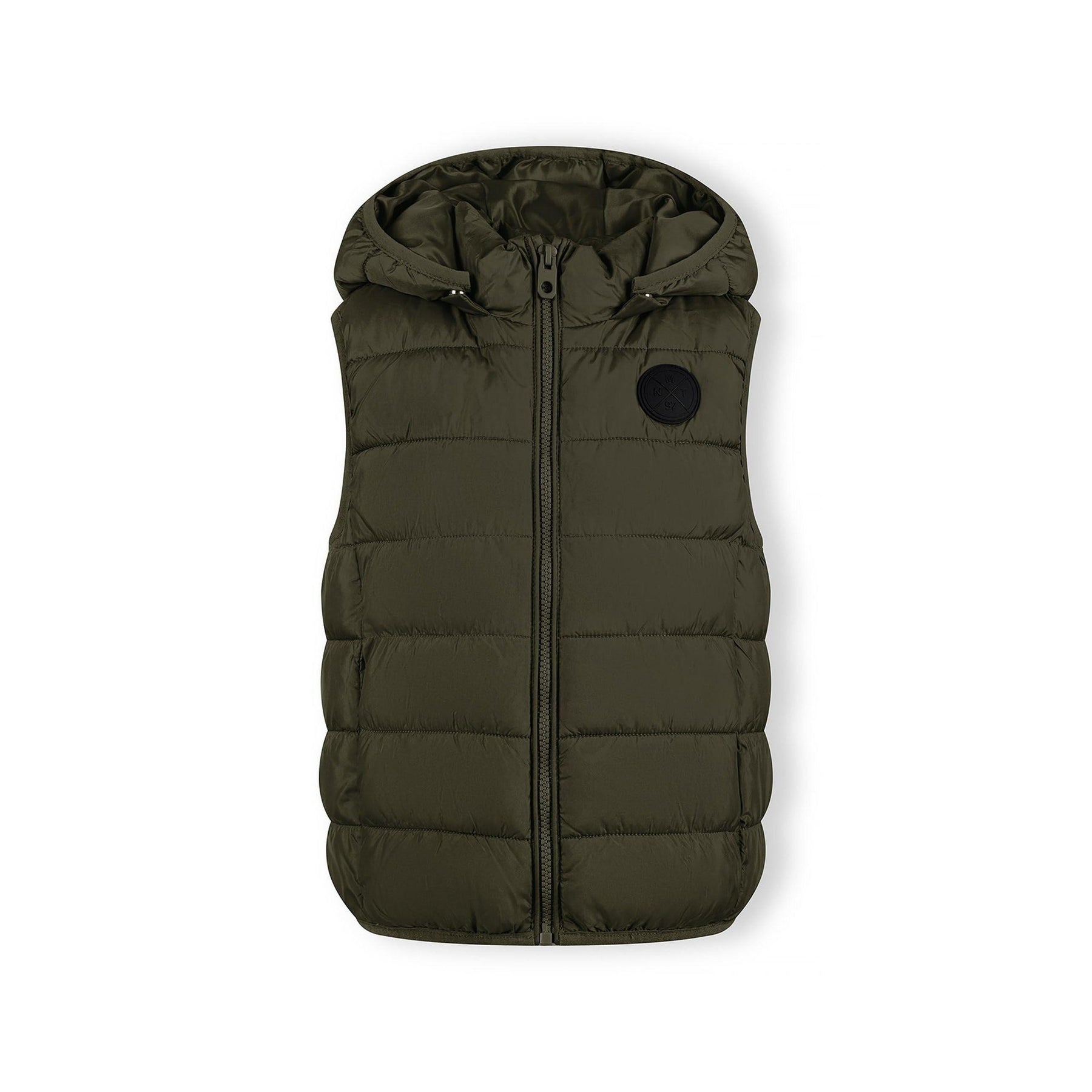 Side view of boy in khaki gilet showing detachable hood and black cargo-style trousers