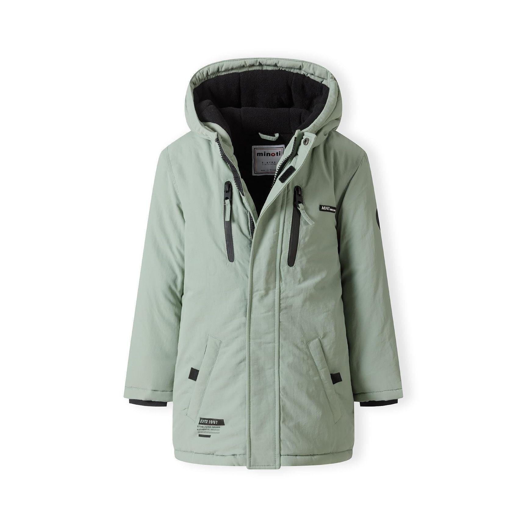 Sage green parka jacket laid flat showing front view with hood, multiple pockets, zippers and Minoti label, white background