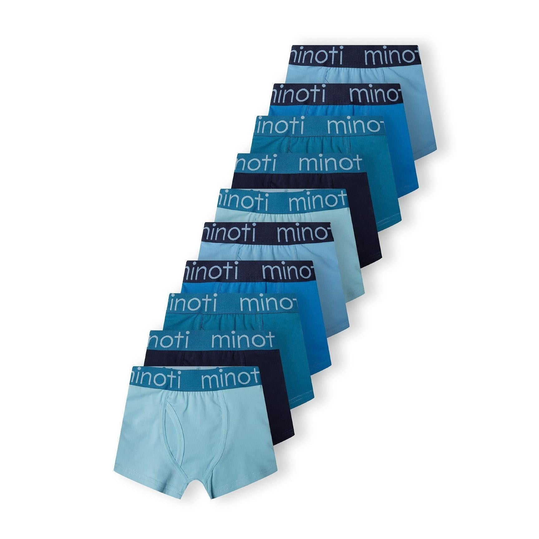 Fan arrangement of 10 blue trunks in varying shades from light blue to navy, showing branded elastic waistbands with Minoti logo on white background