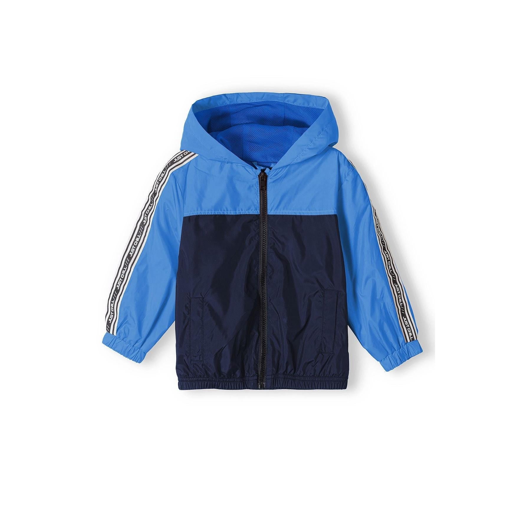 Back view of cobalt blue and navy windbreaker jacket showing colorblock design and hood detail against white background