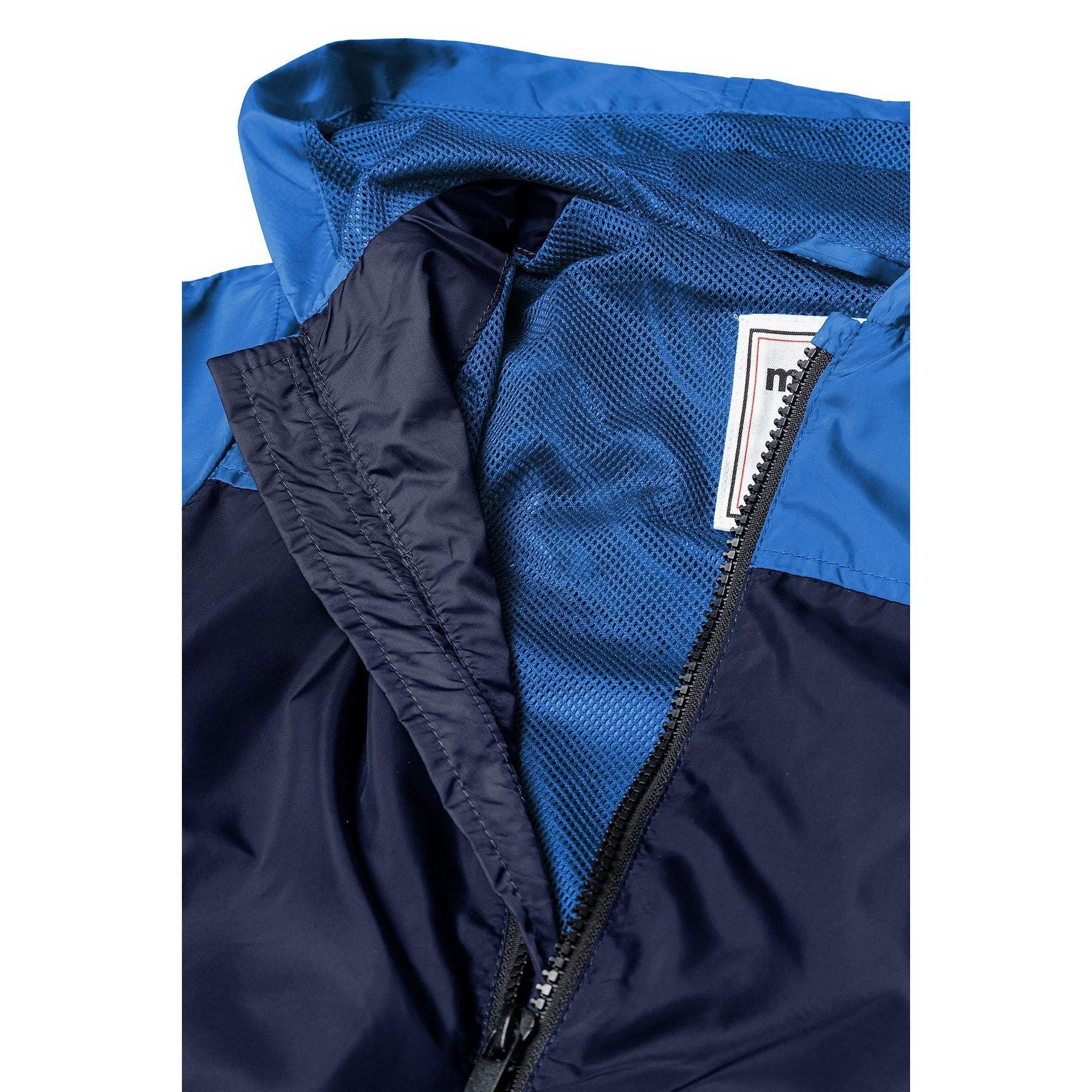 Close-up detail of windbreaker jacket showing front zip, hood lining, and Minoti brand label inside collar area