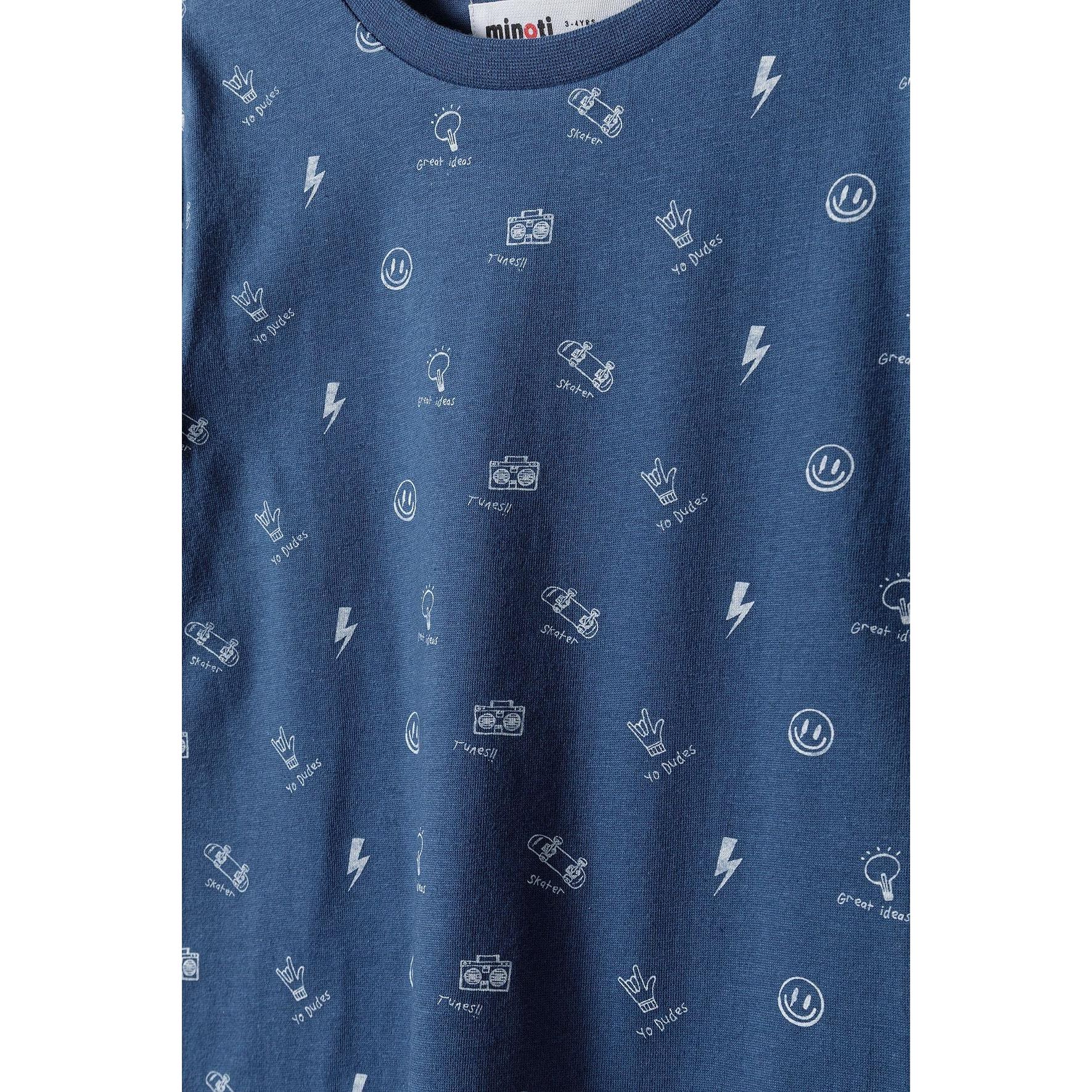 Close-up detail of navy t-shirt fabric showing scattered white graphics including cameras, lightning bolts and smiley faces