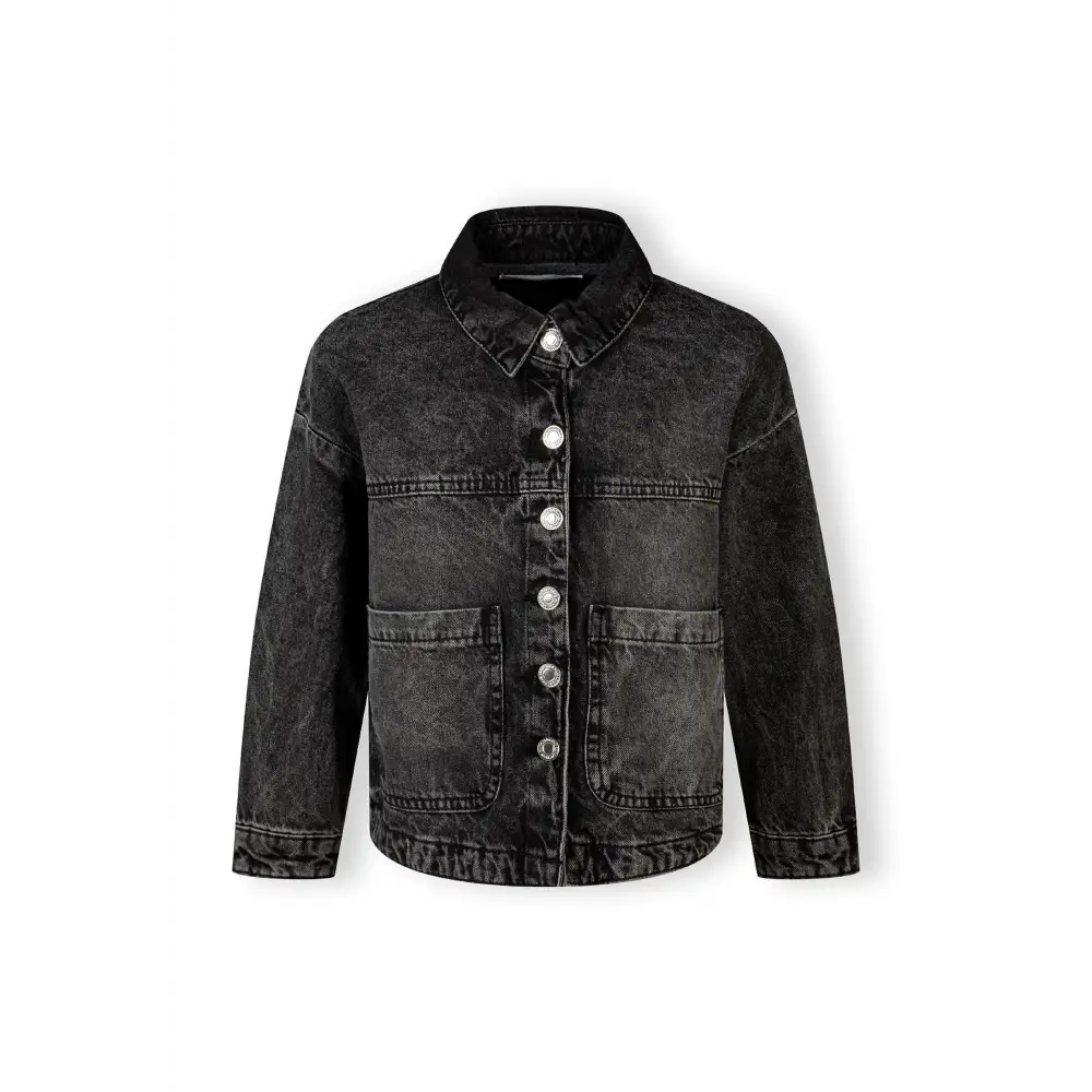 Back view of black acid wash denim jacket showing oversized fit and classic denim construction details on white background