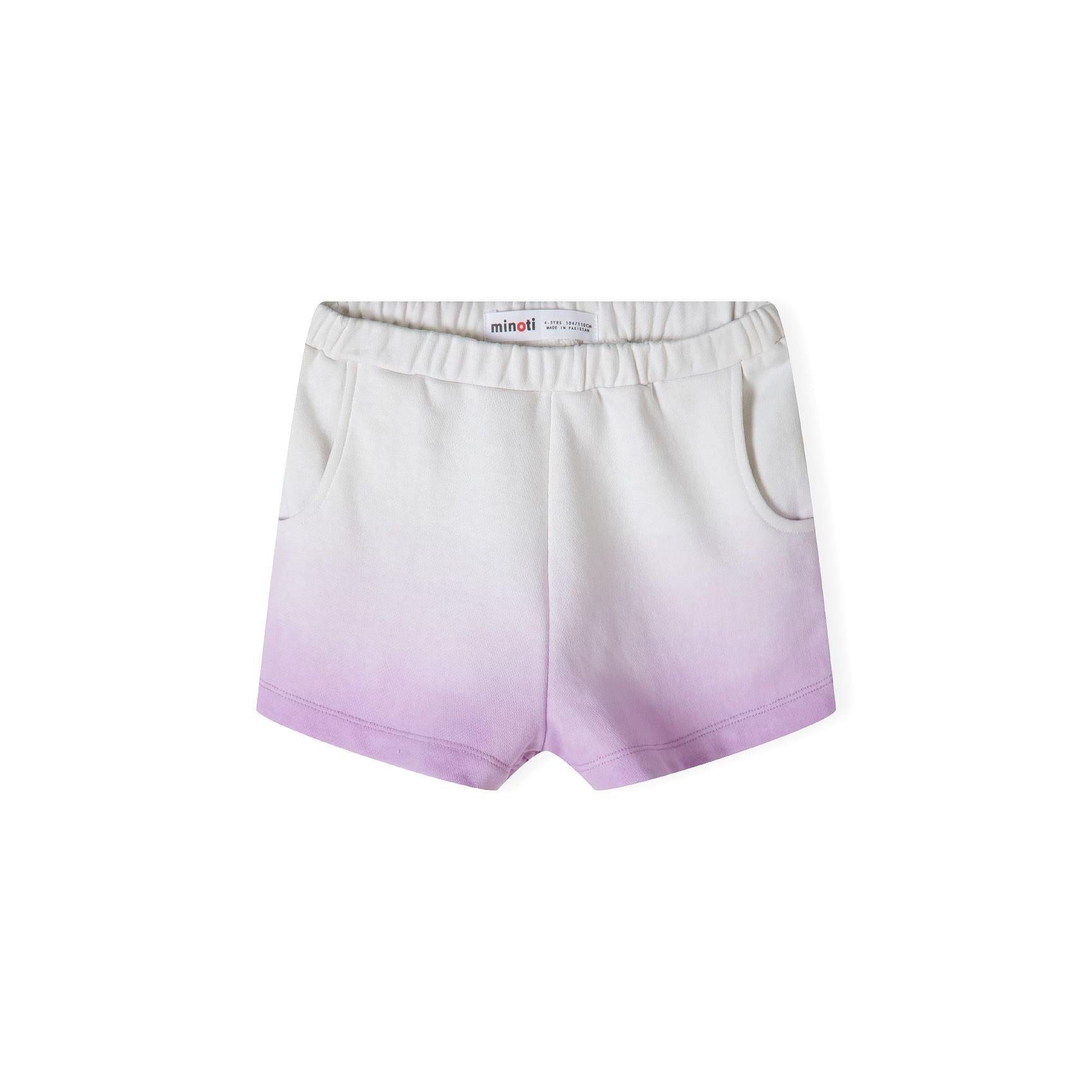 Close-up detail of cream to purple ombré fleece fabric with golden glitter 'Cool Days' text and Minoti brand label