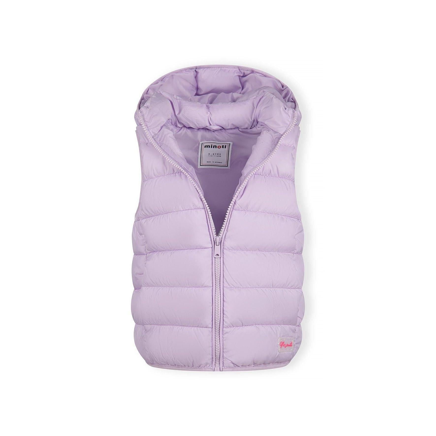 Close-up detail of lilac quilted fabric texture showing stitching pattern and Minoti brand label with glitter finish