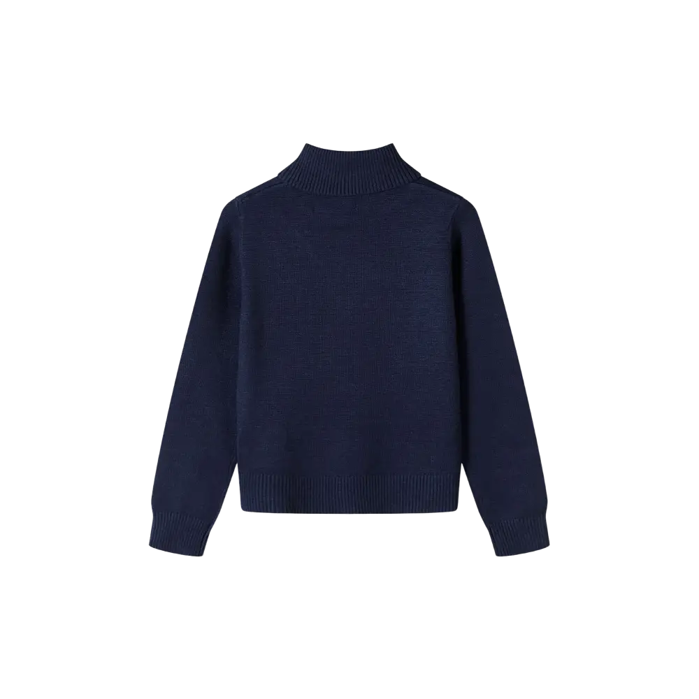 Navy turtleneck jumper laid flat against black background showing ribbed collar detail and fine knit texture, long sleeves visible