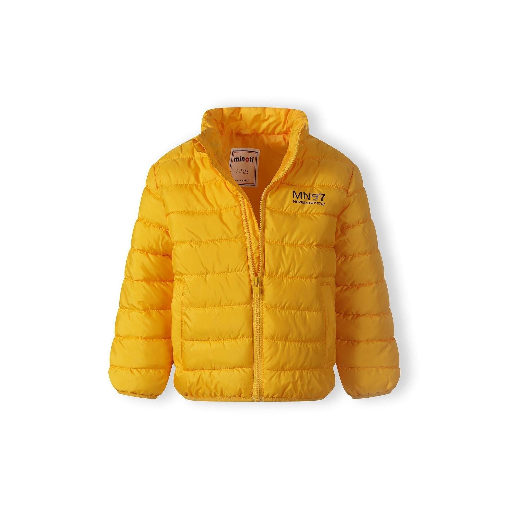 Close-up detail of yellow jacket showing zip closure, Minoti brand label, and quilted padding texture