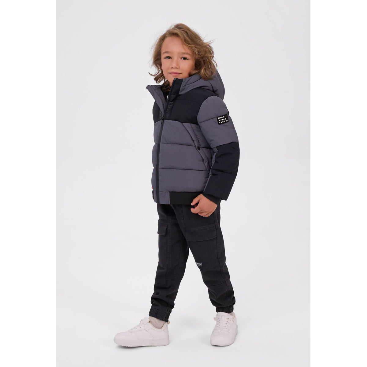 Hooded padded jacket in grey and black — full view on white square background