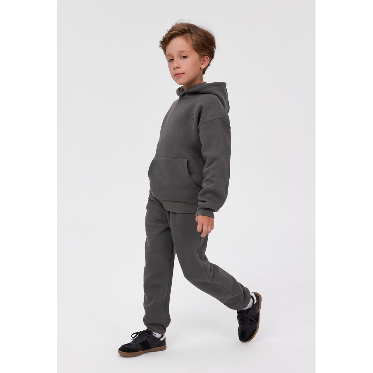 Hoodie and slim-fit joggers set in khaki — full view on white square background