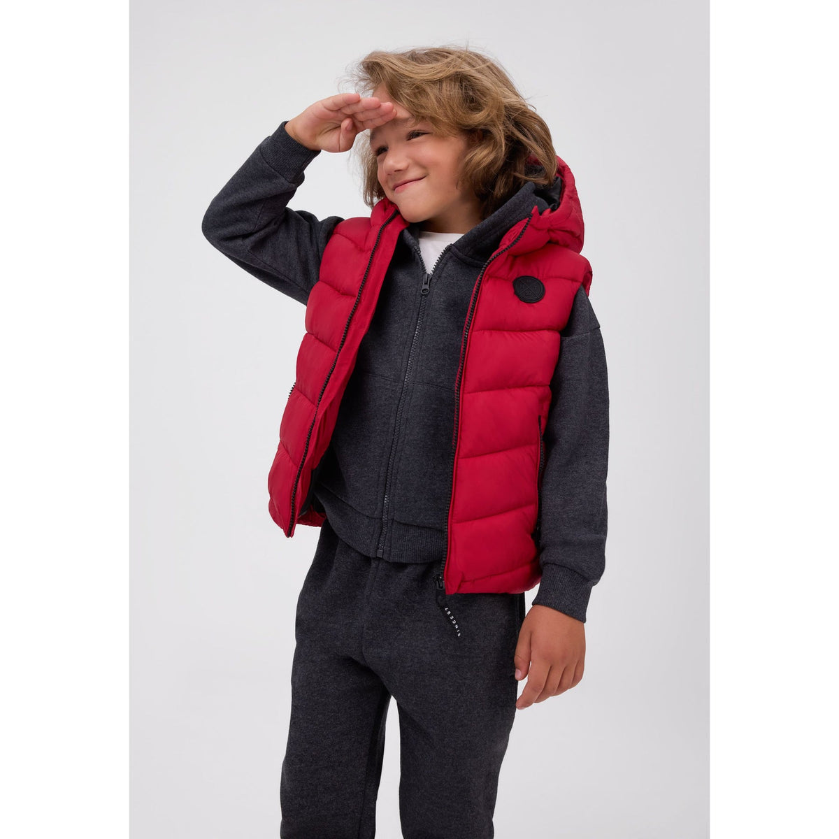 Hooded padded gilet in red — complete product view for square Shop card