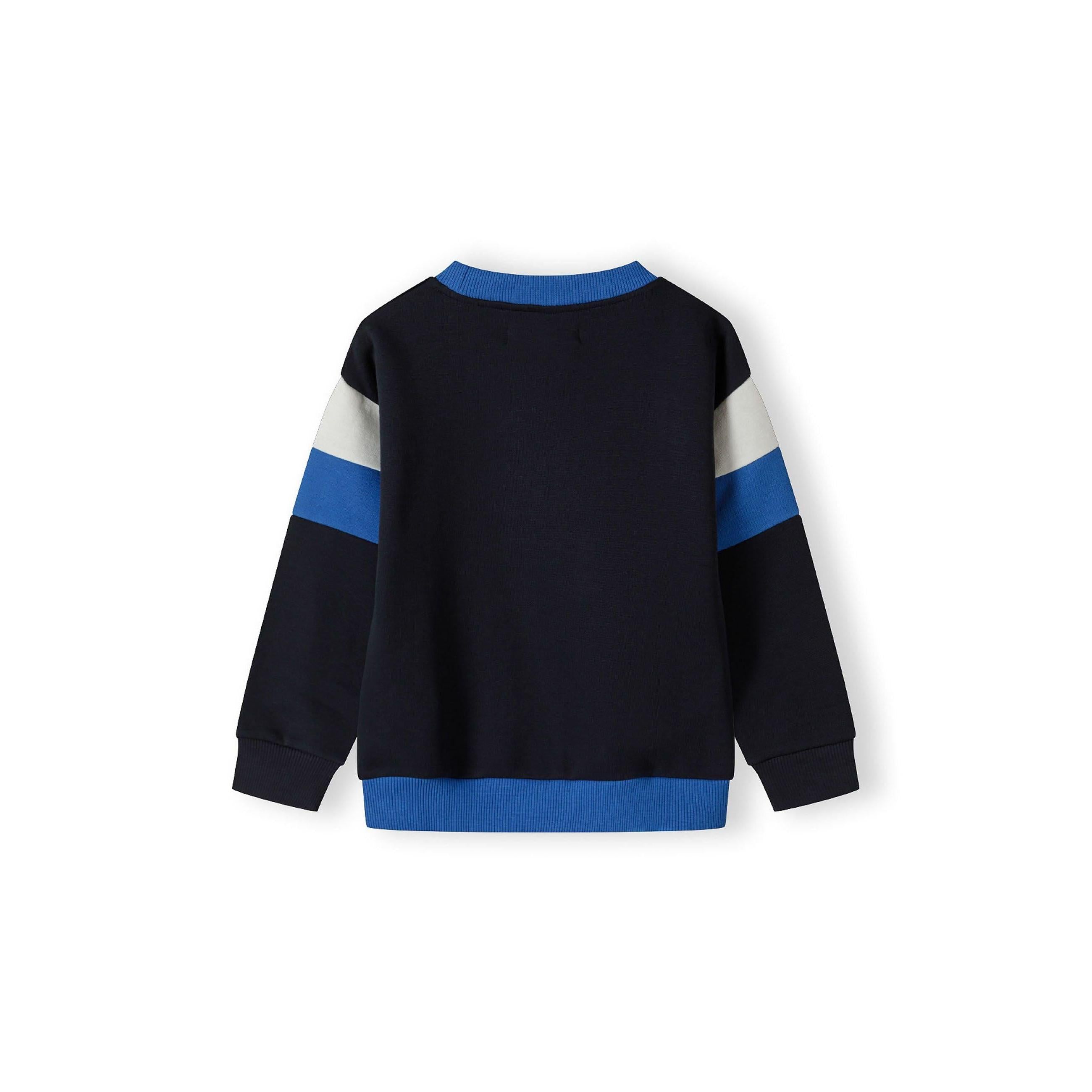 Close-up detail of navy jogger waistband with blue drawstring ties and side panel construction