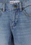 Close-up of light blue kids jeans with unique design stitching and metal button detail on waistband