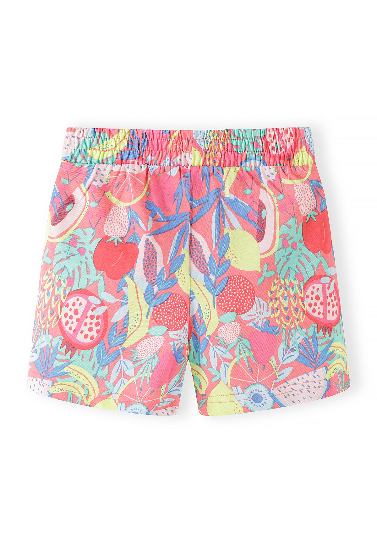 Close-up detail of tropical print jersey shorts showing vibrant pineapple, flamingo and palm leaf pattern with elasticated shirred waistband