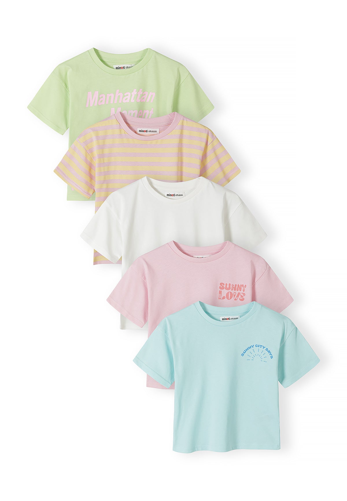 Stack of five pastel coloured t-shirts displayed on white background showing green top with text, striped pink and yellow, plain white, pink with text, and mint blue with logo