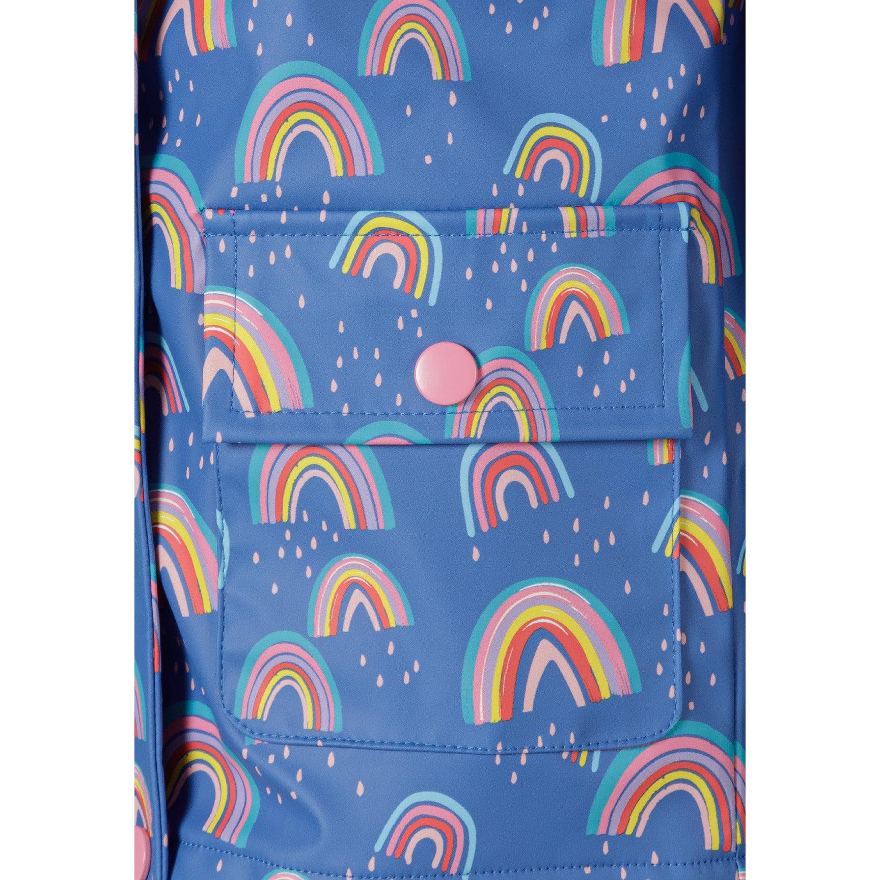 Open cobalt blue rain jacket displaying pink interior lining, front zip closure and rainbow print exterior on white background