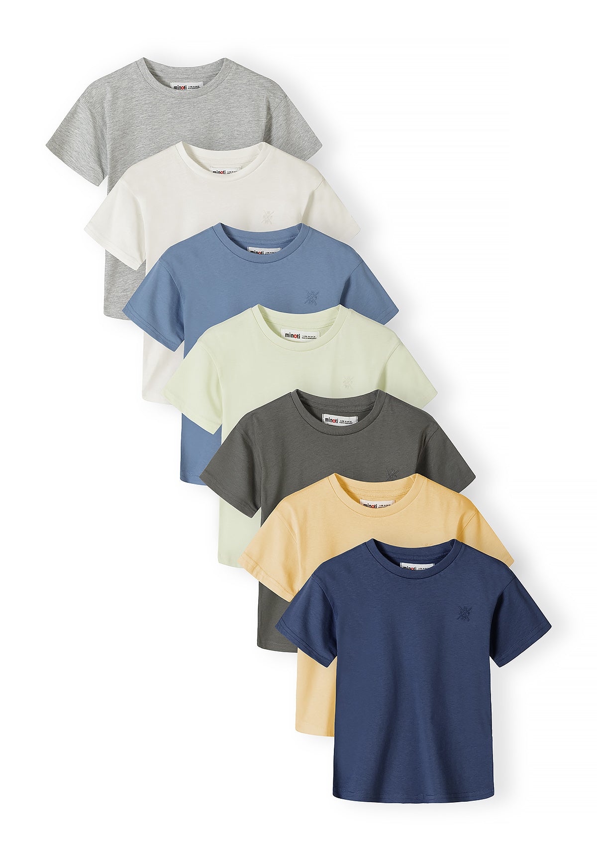 Seven cotton t-shirts in earth tone colours arranged in a cascading display showing grey, cream, blue, light green, dark green, yellow and navy colours against white background