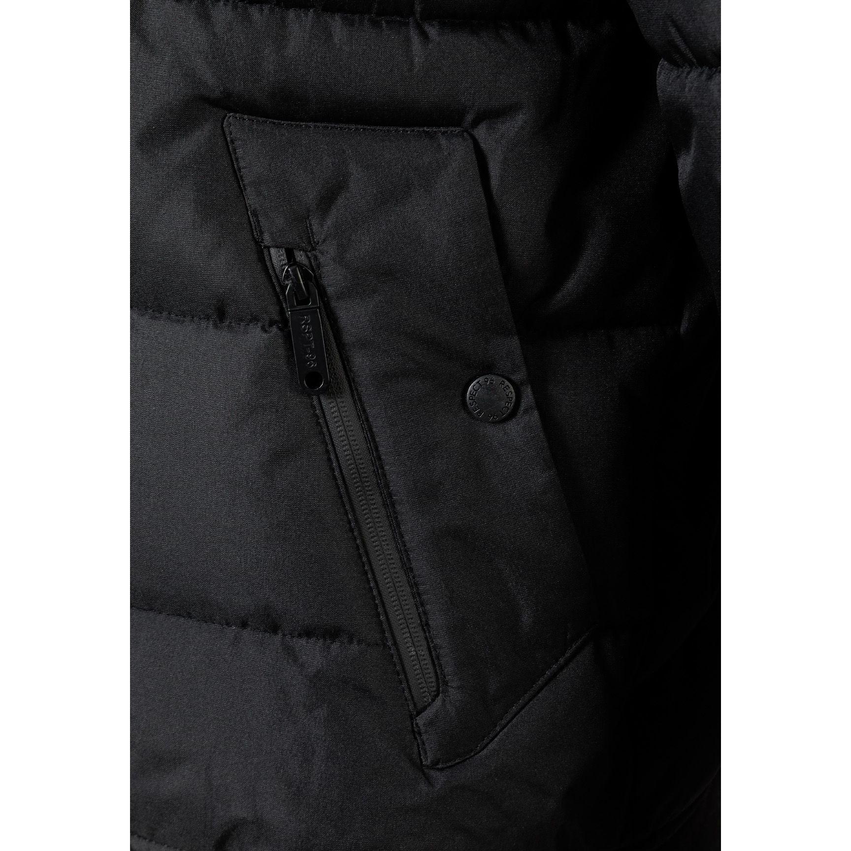 Close-up detail of black fabric patch with RSPF 96 brand authentic worldwear logo embossed on padded jacket material