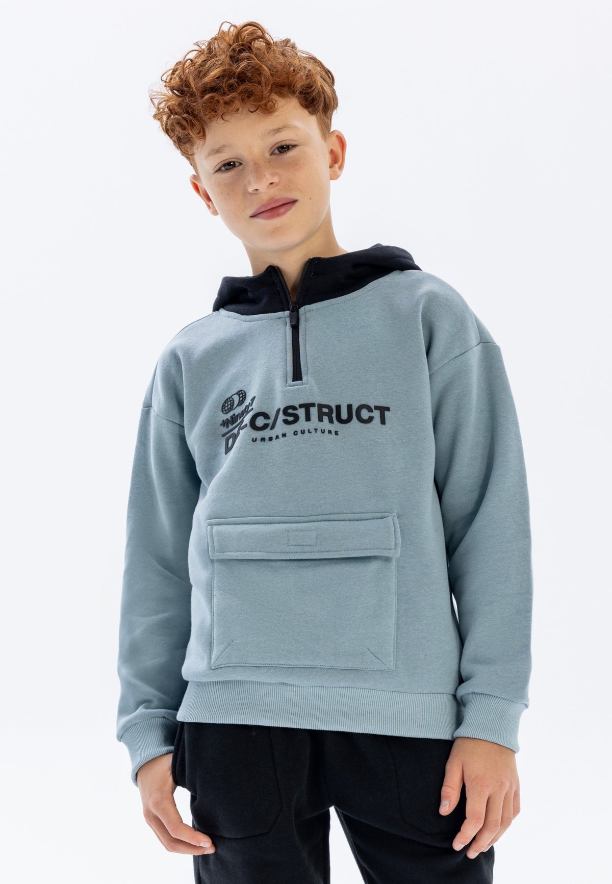 Blue grey and black quarter-zip hoodie, model front.
