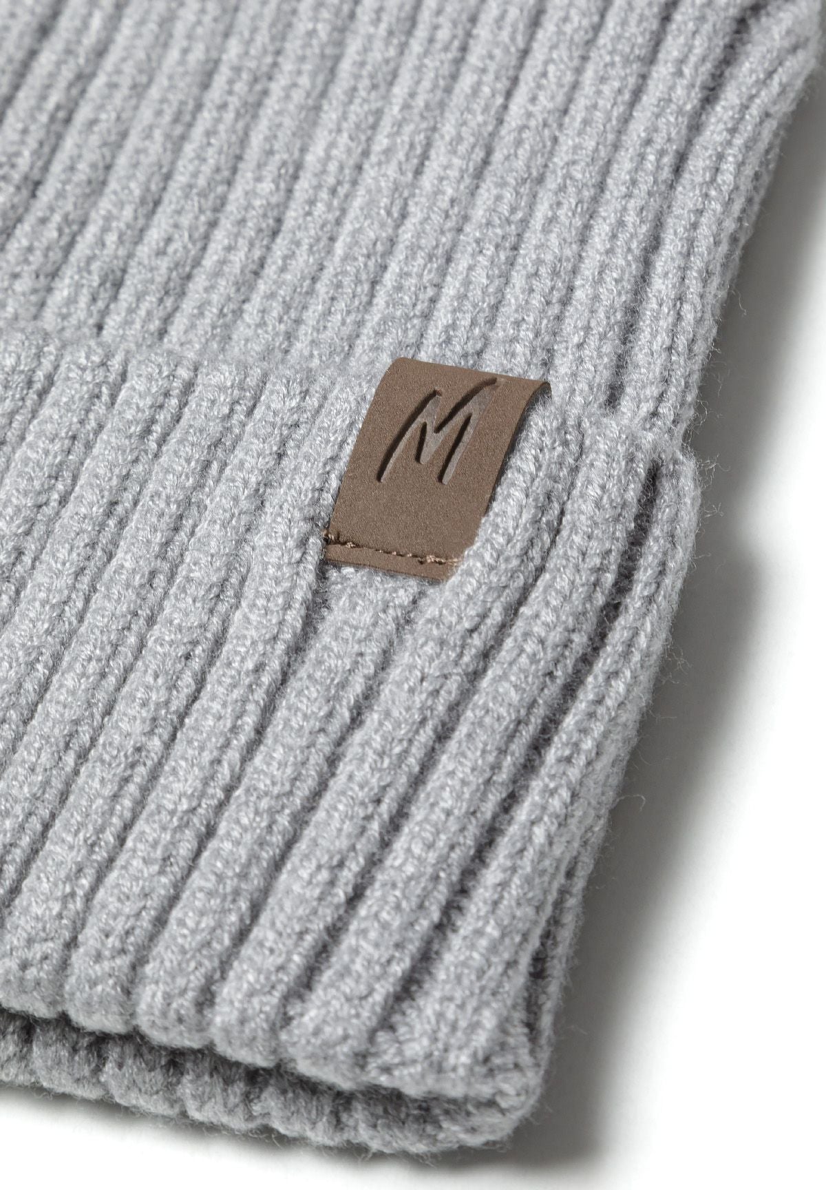Grey, burgundy and navy ribbed beanies, grey badge detail.