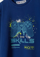Navy graphic t-shirt featuring a gaming controller design with colorful splashes. Designed for boys in ages 2-14.