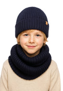 Close-up of a boy wearing a navy ribbed beanie and snood set.