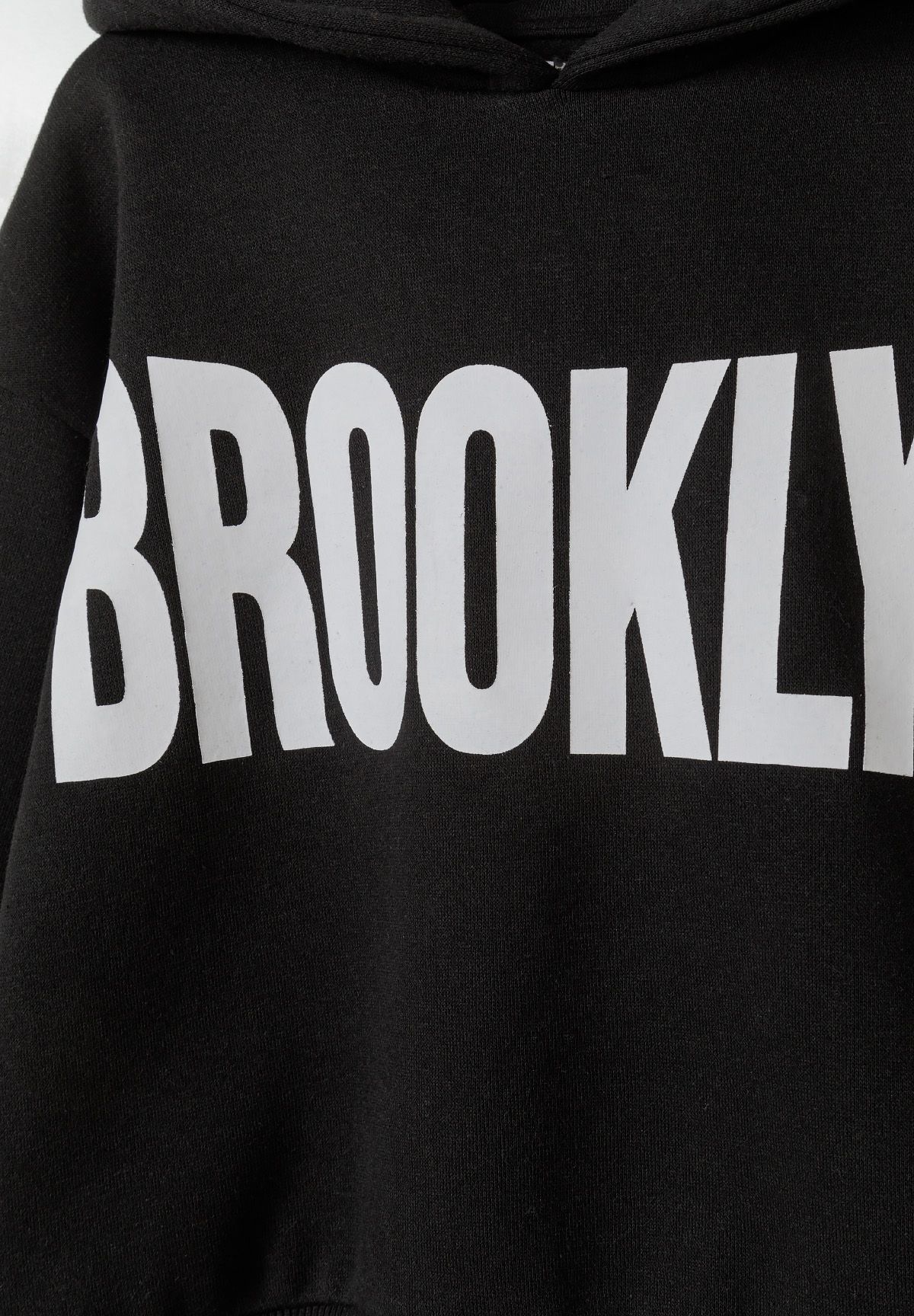 Black hoodie and joggers set, brooklyn chest lettering.