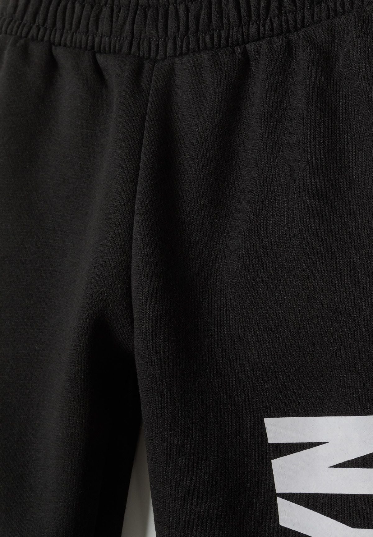 Black hoodie and joggers set, elasticated waistband.
