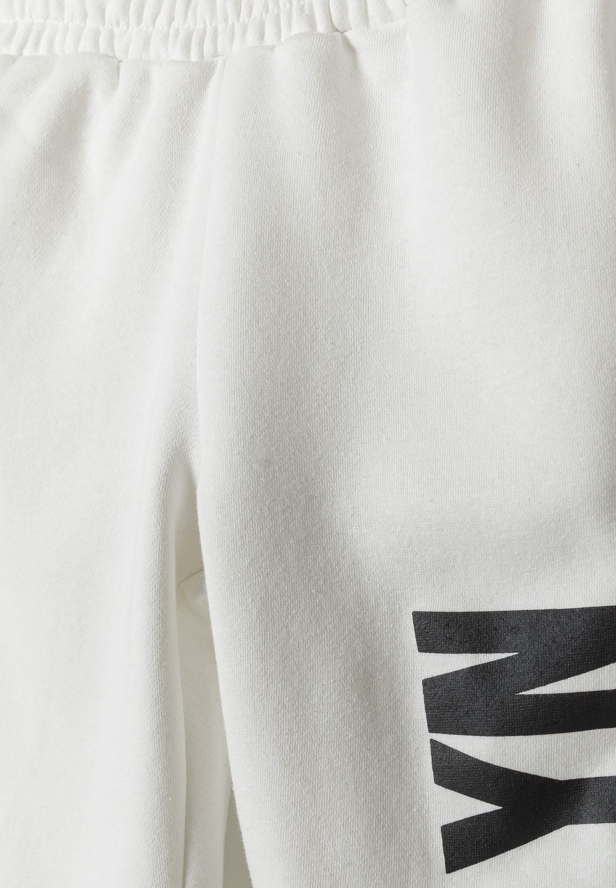 White hoodie and joggers set, elasticated waistband.