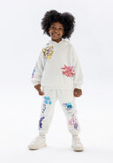 Girls hooded tracksuit in cream with printed details, featuring a kangaroo pocket and elasticated waistband.