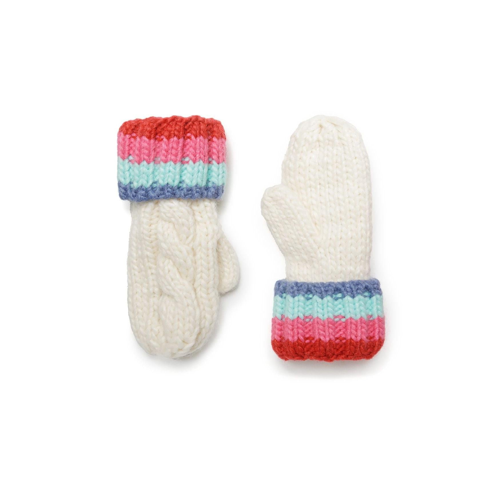 Close-up of cream cable knit mittens with rainbow striped cuffs showing detailed knit texture on white background