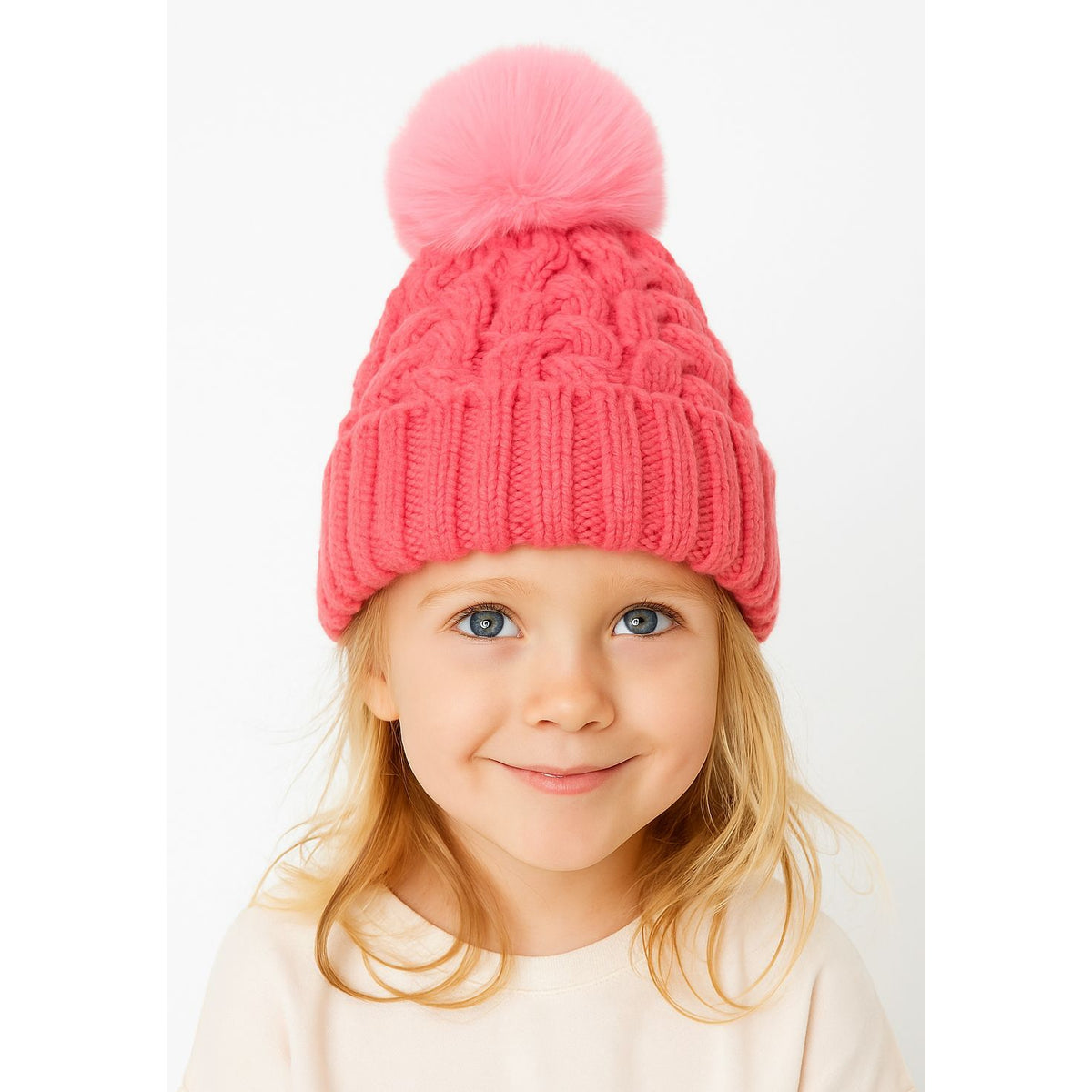 Girls' cable-knit bobble hat in bright pink — complete product view for square Shop card