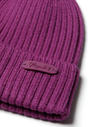 Ribbed knit girls beanie in vibrant purple with a snug elasticated edge, perfect for ages 2-14Y. Reliable warmth and comfort.
