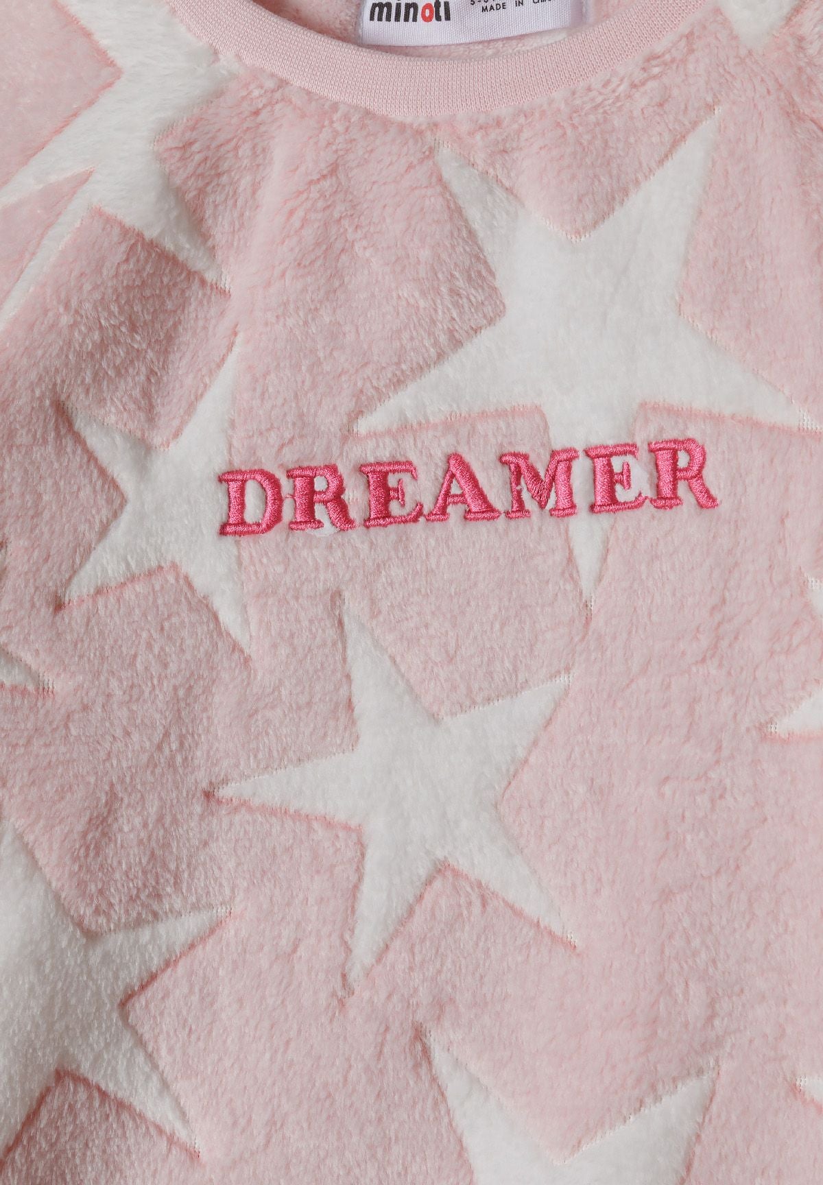 Pink and white fleece pyjamas, star fleece detail.