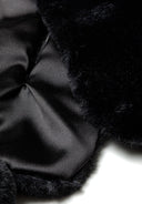 Soft black faux fur texture with pom pom details, designed for girls aged 2-14y. Provides warmth and comfort.