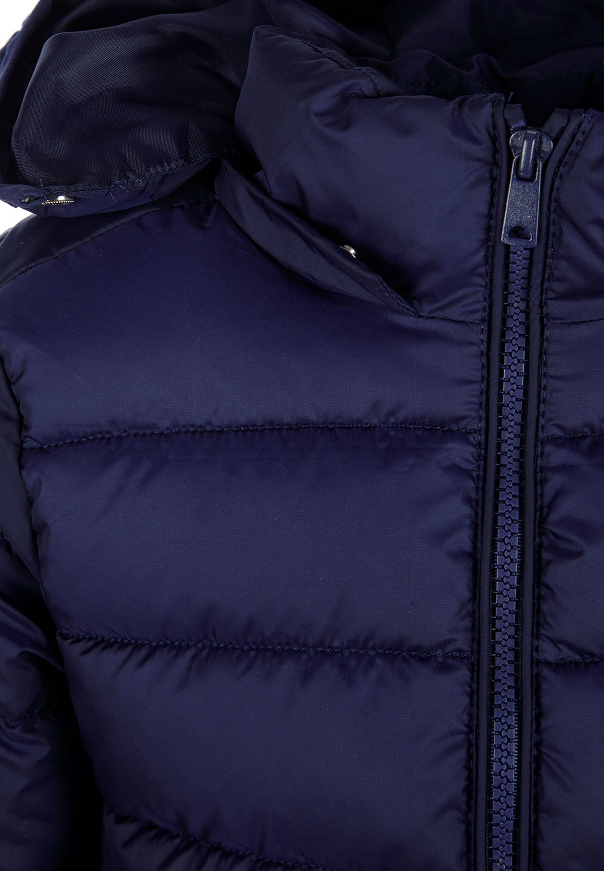 Close-up of the hood attachment on the navy puffer jacket.