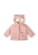 Girls teddy jacket in light pink, front view with hood and buttons, featuring two patch pockets.