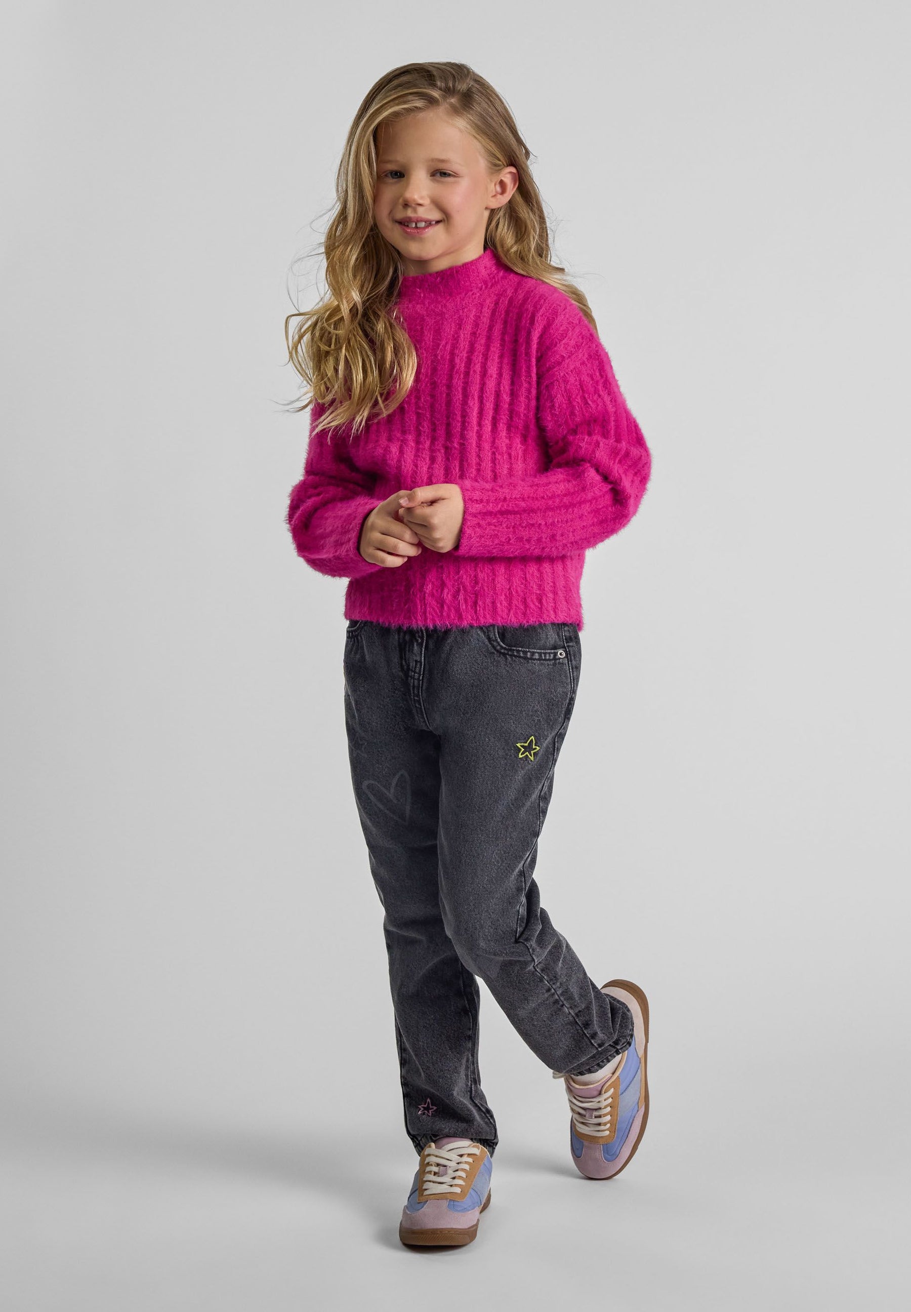 Girls pink high neck jumper with long sleeves, ribbed cuffs and hem, front view.