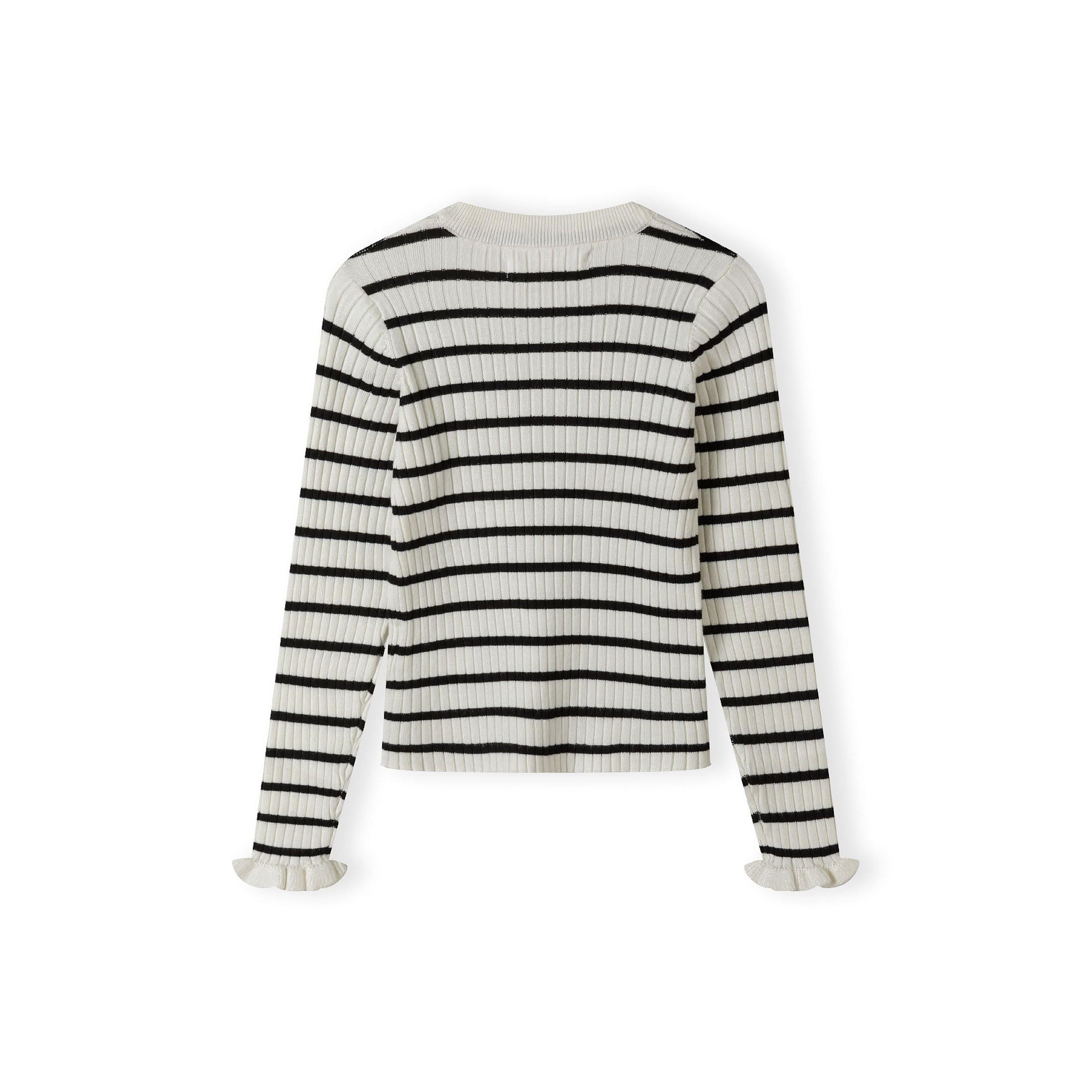 Flat lay of cream and black horizontally striped ribbed jumper with frill cuff details on white background