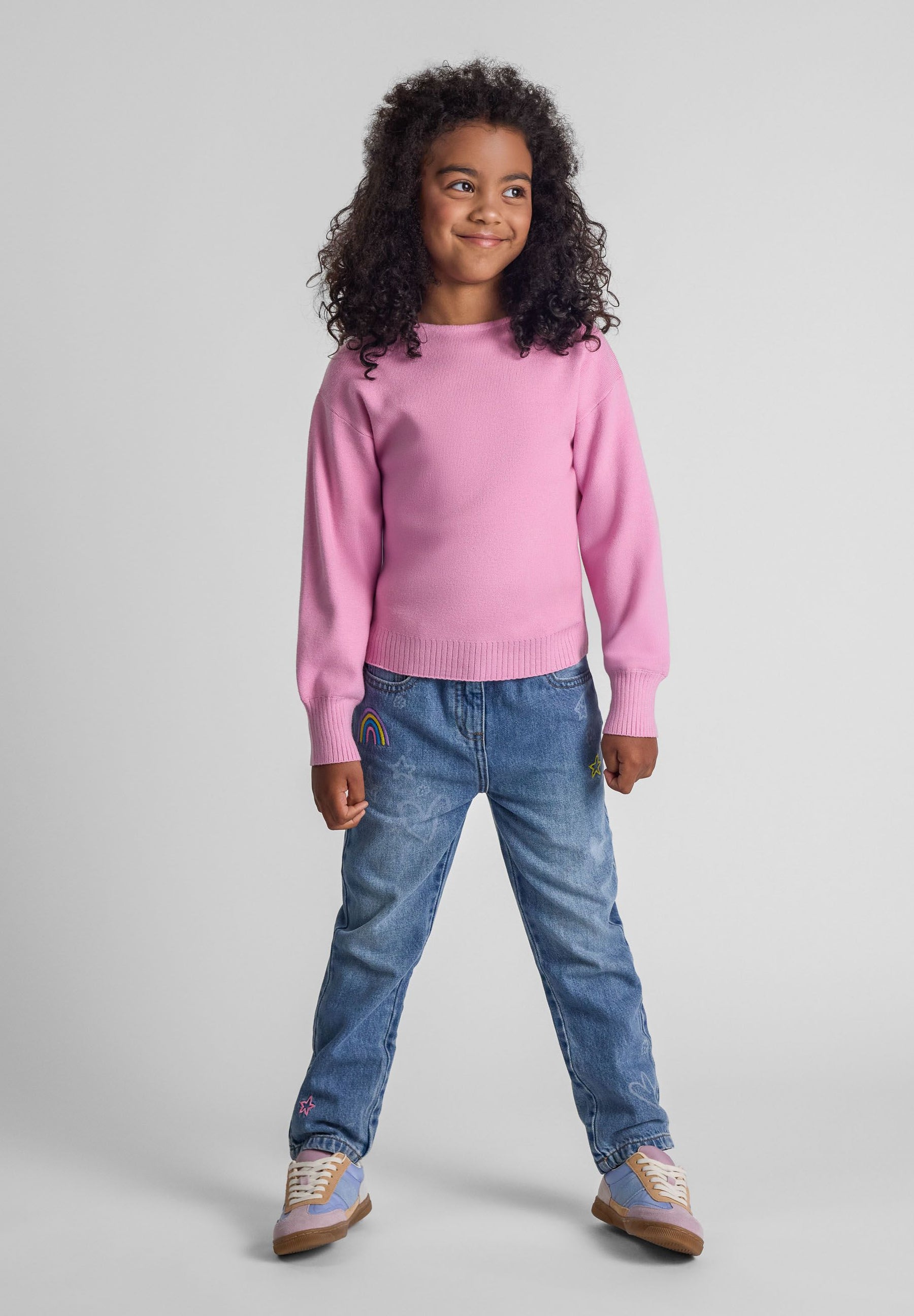 Girls pink jumper with boat neckline, relaxed fit and long sleeves.