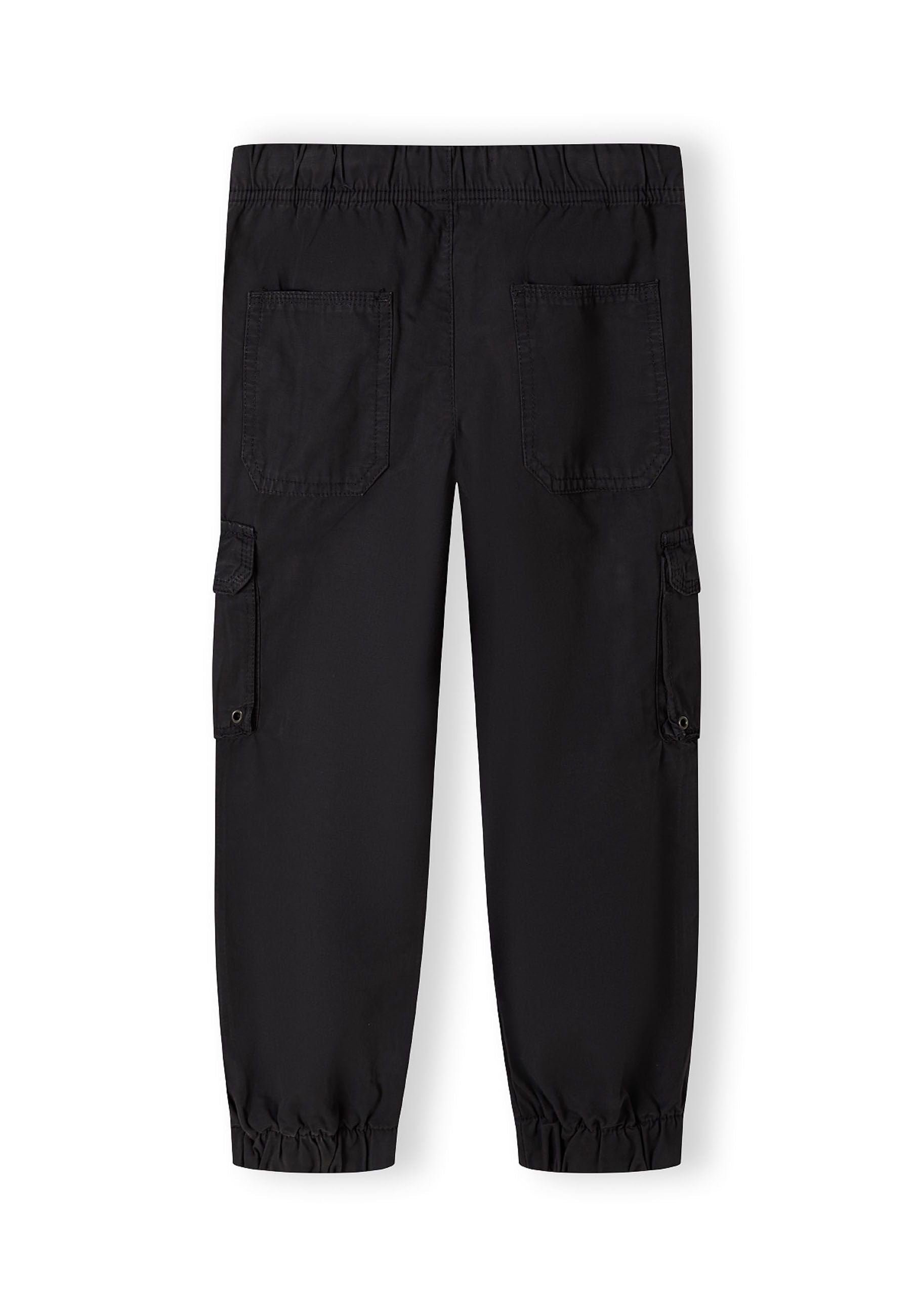 Girls black cargo pants, back view, featuring adjustable waistband and multiple pockets.